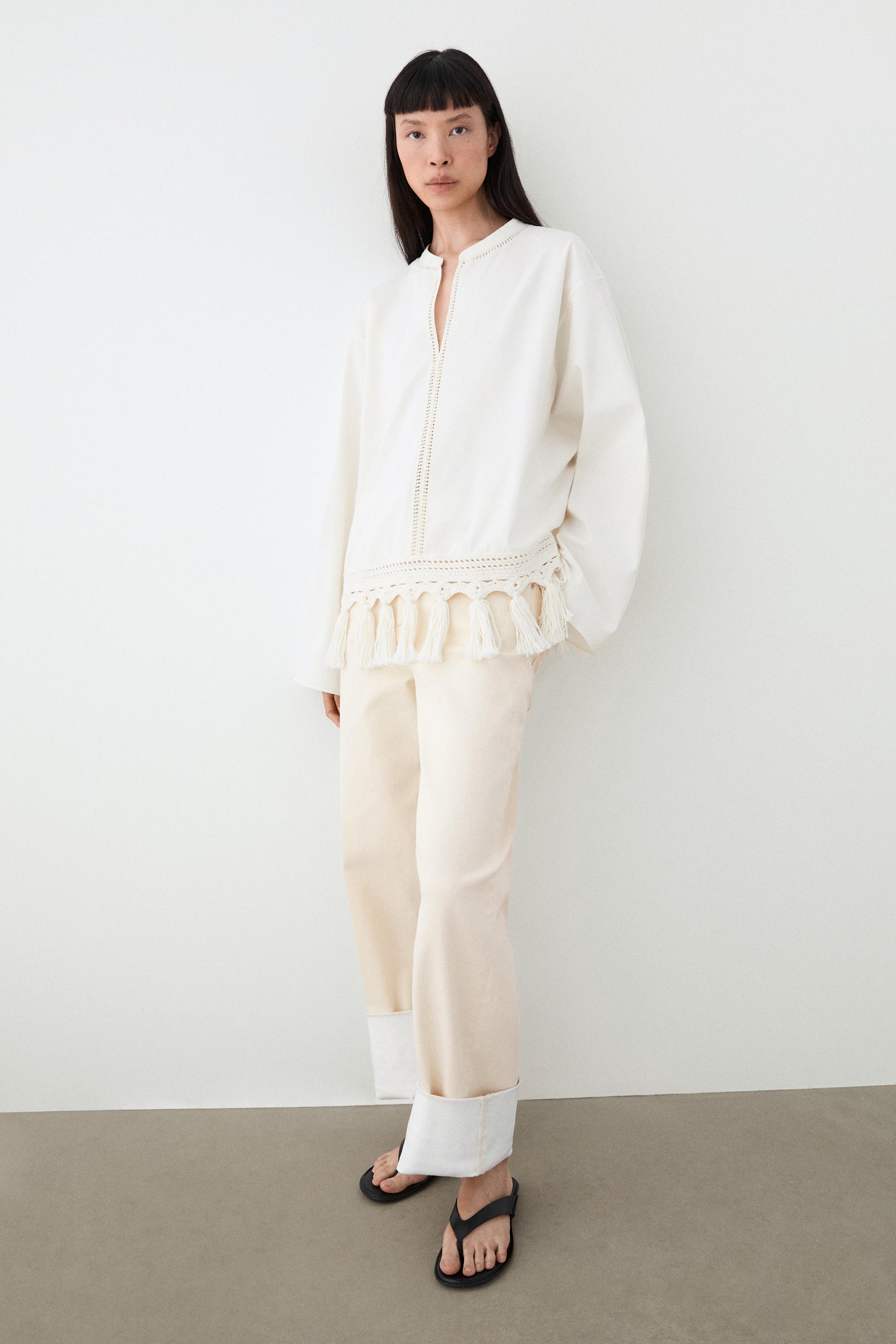 Embroidered blouse with fringed hem — WHITE
