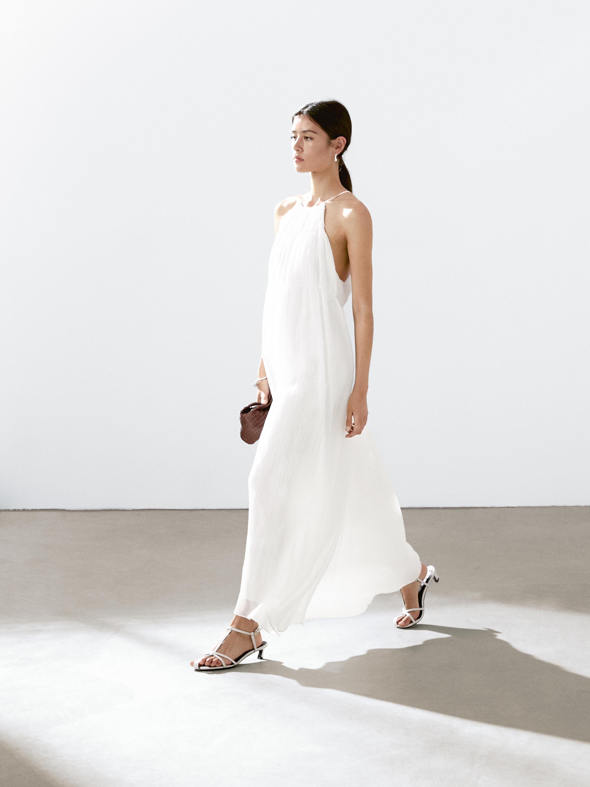 Long pleated dress with gathered detail