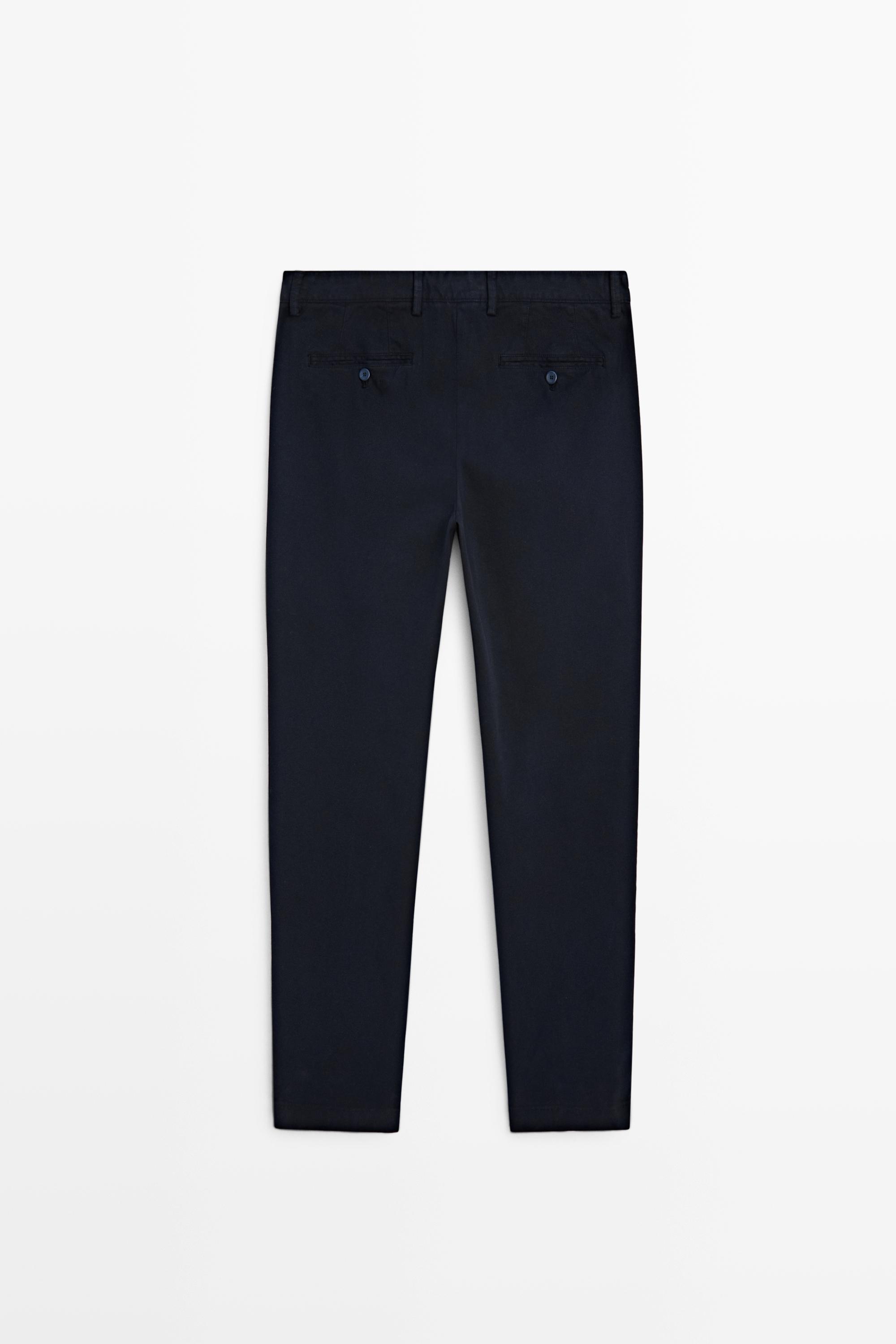 Slim-fit micro-textured trousers — NAVY BLUE