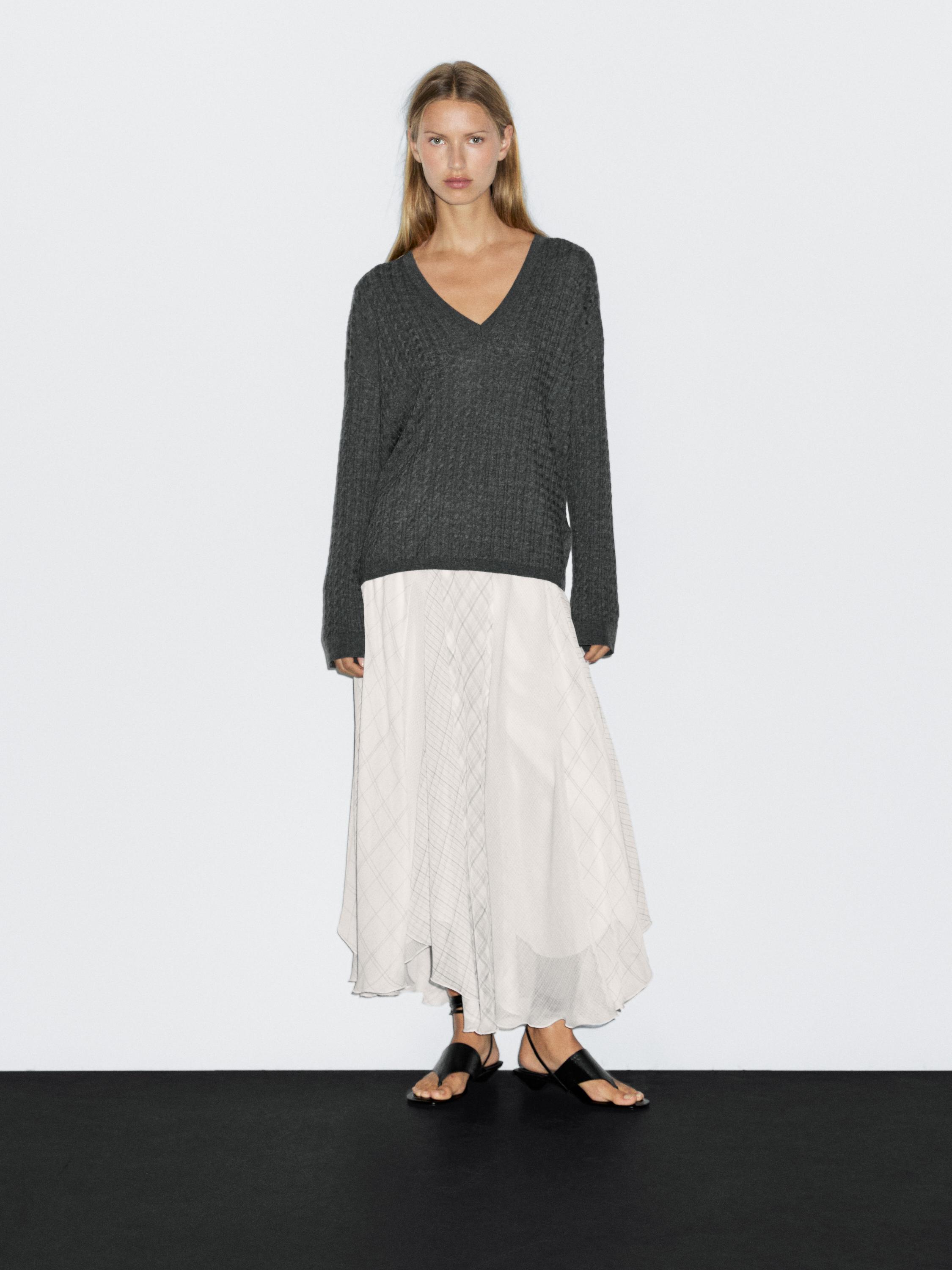 Jersey punto trenzado cuello pico