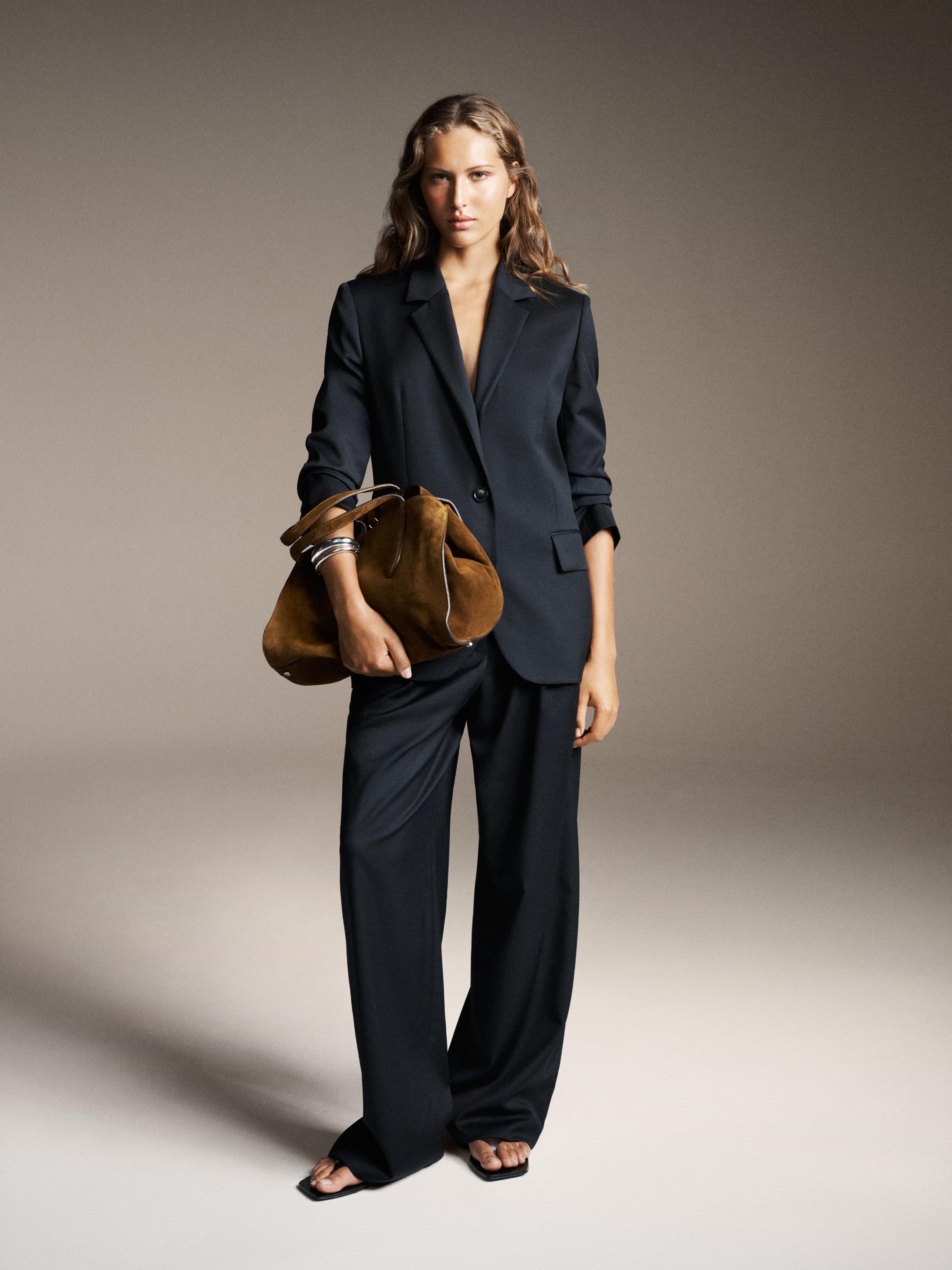 100% extra fine wool pleated trousers