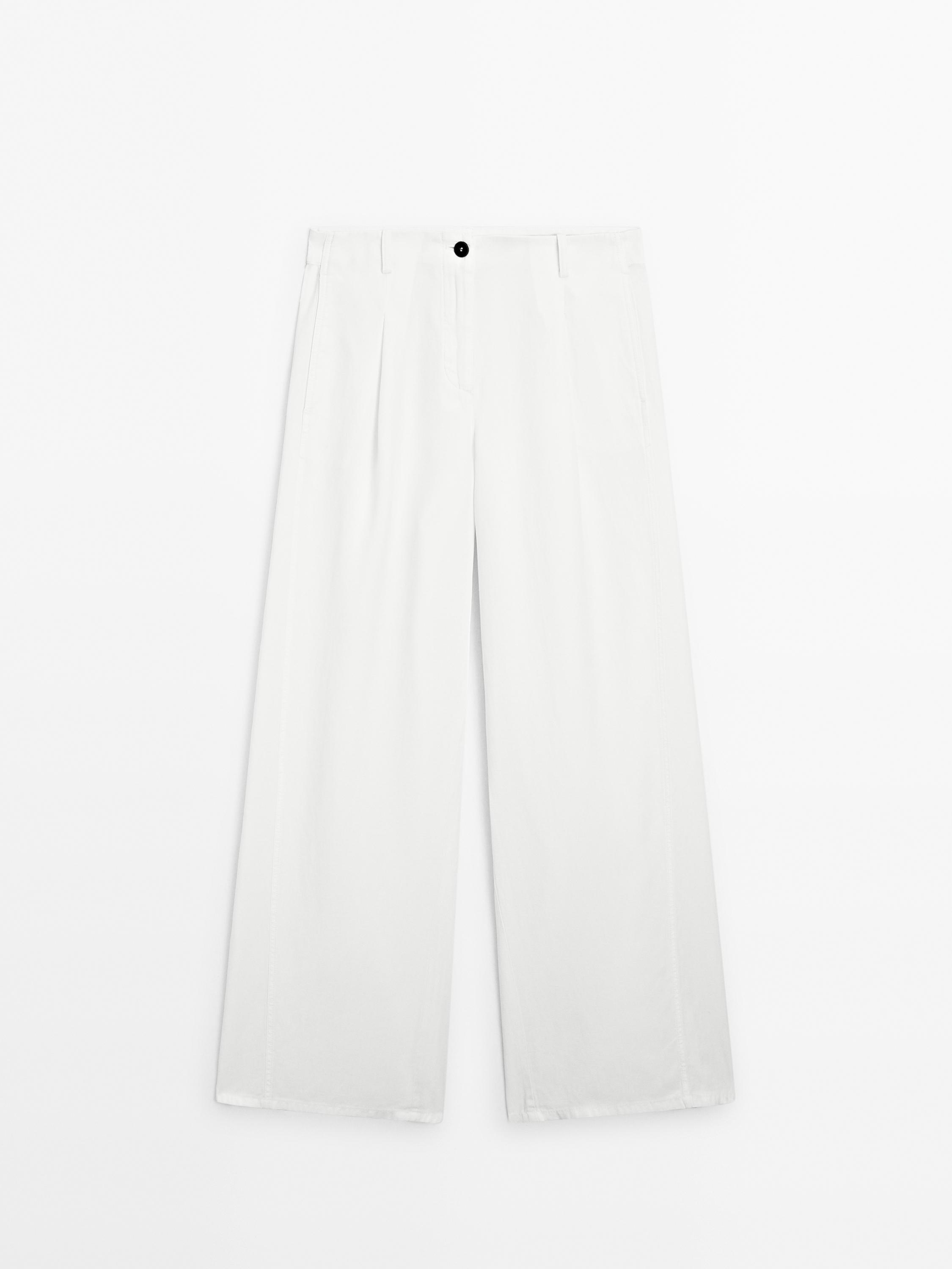 Flowing barrel fit trousers with seam detail