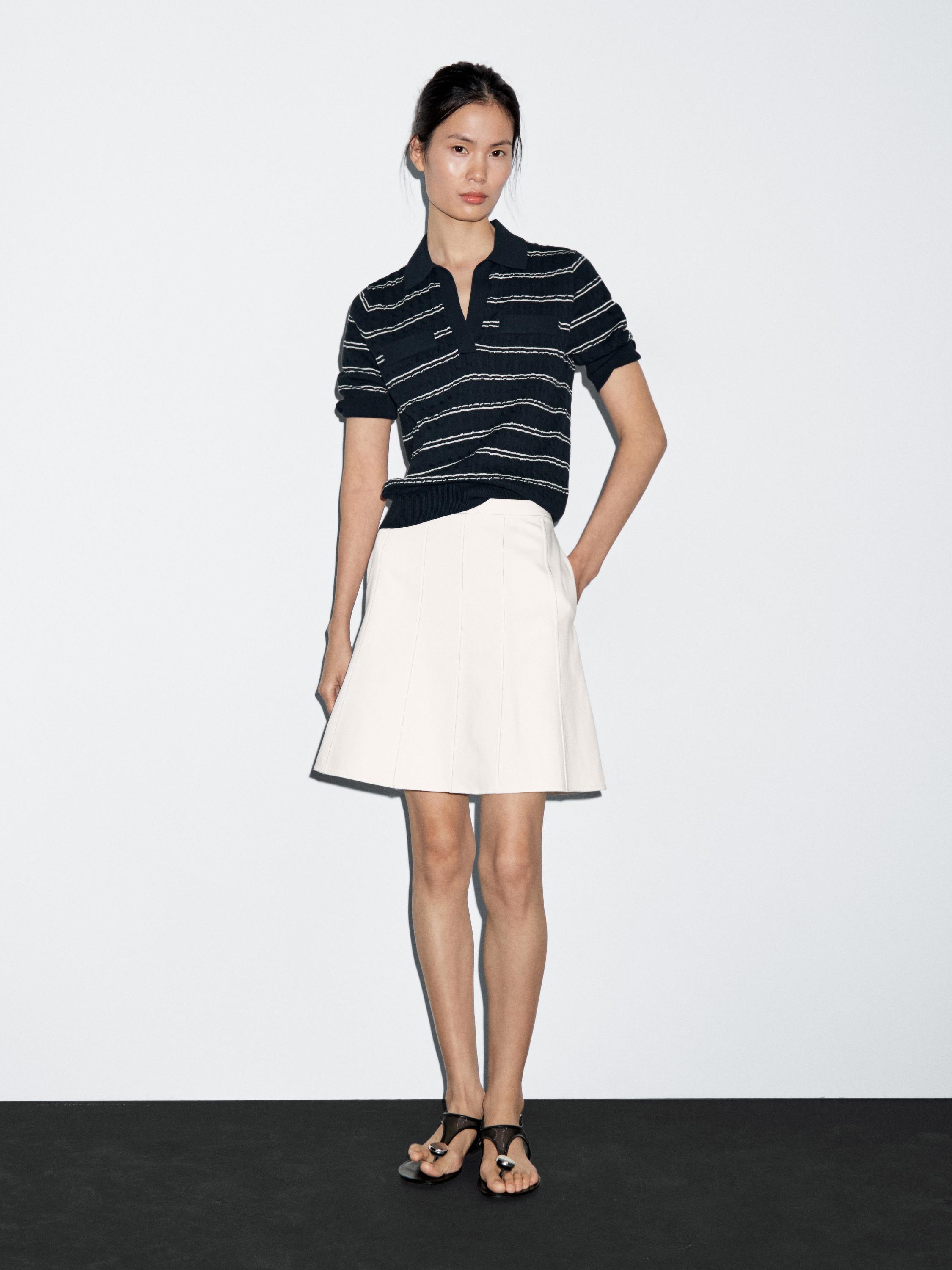 Short denim skirt with seam details