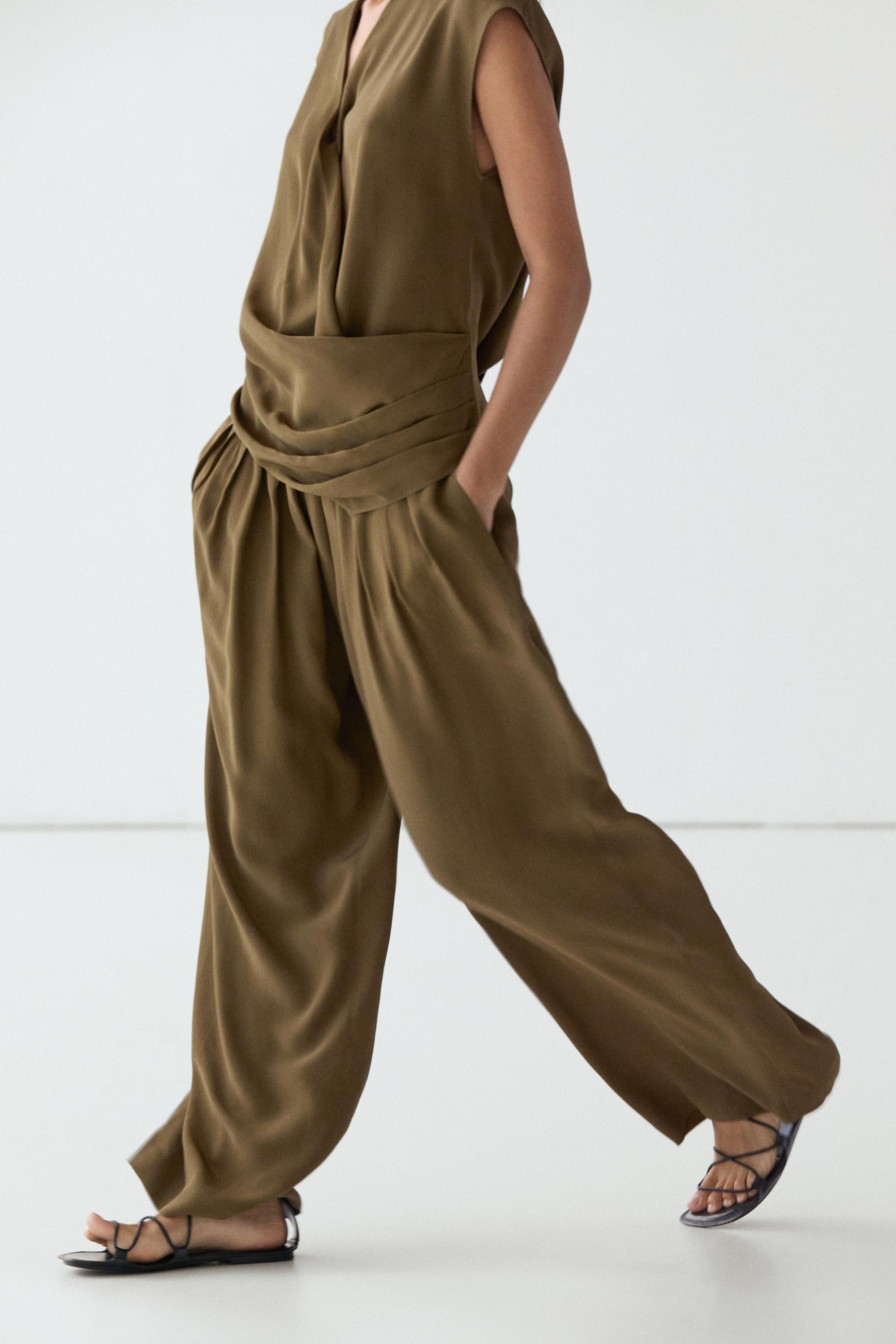 Total look flowing trousers with box pleats — MOSS GREEN