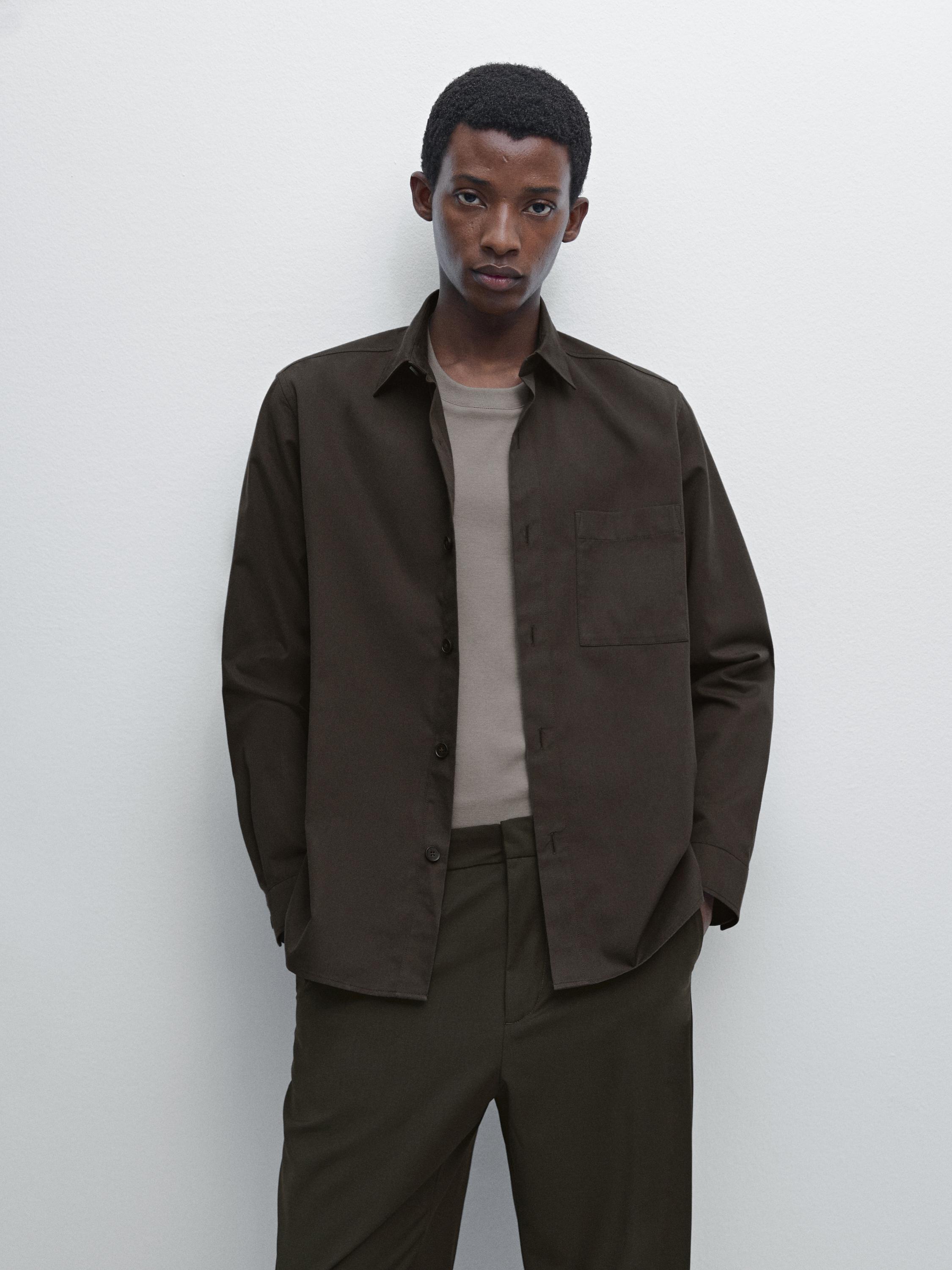 Brown long-sleeve shirt set with front pocket and matching pants.