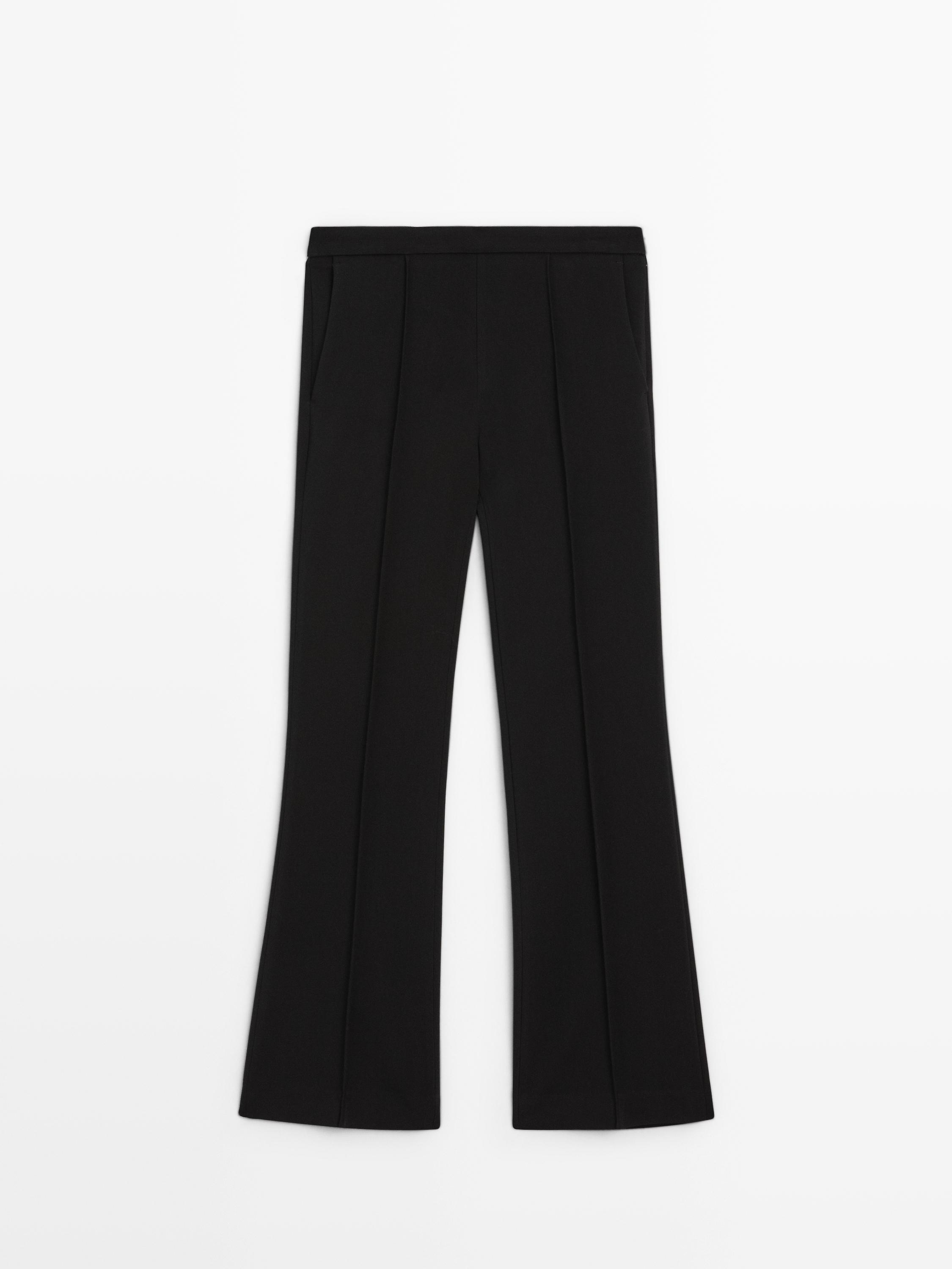 Pantalón crepé detalle costura