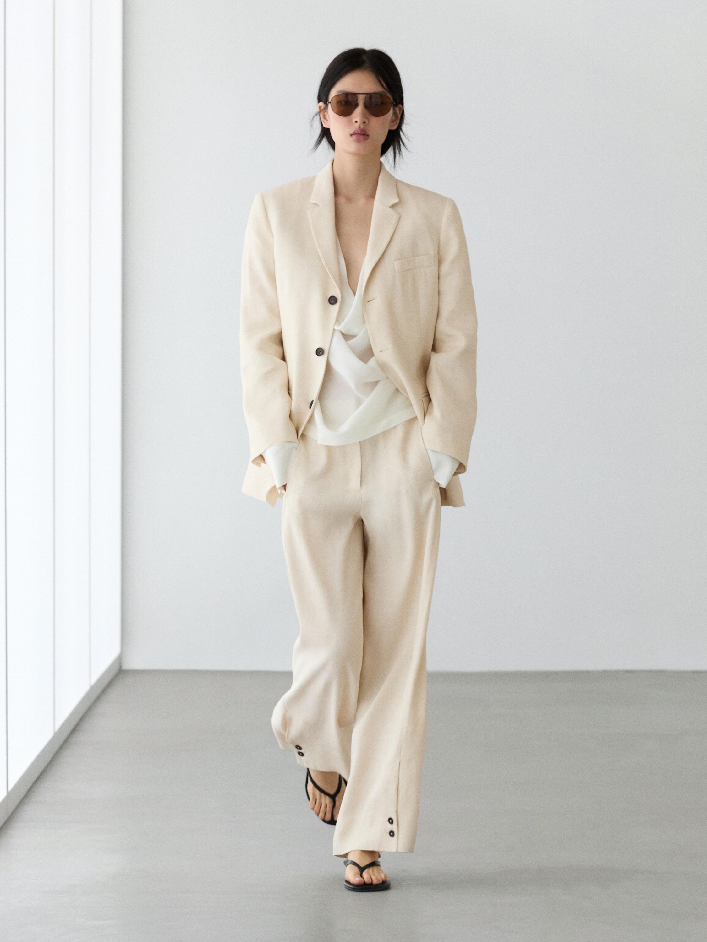Linen blend suit trousers with button detail — CREAM