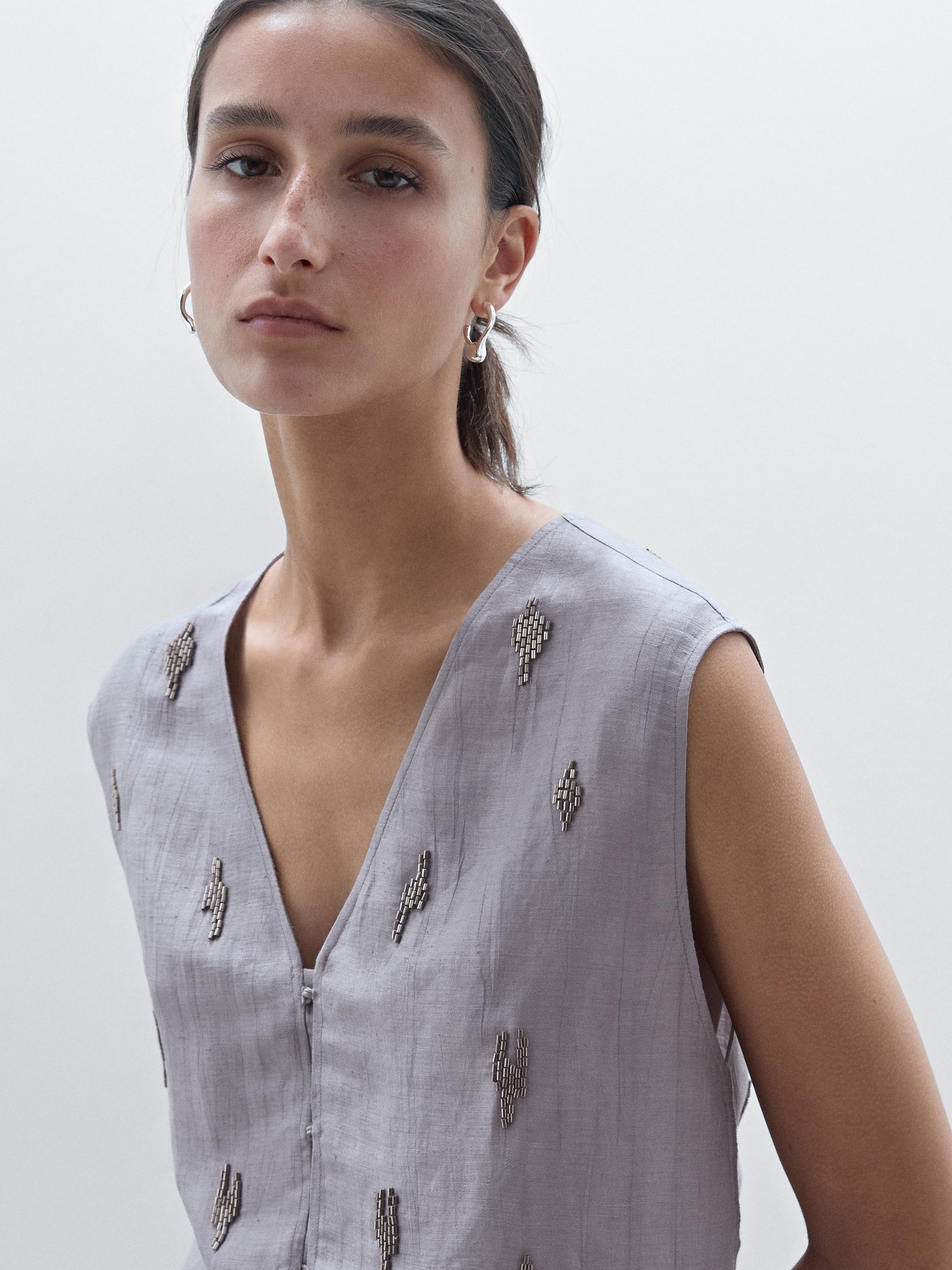 100% linen top with rhinestone detail