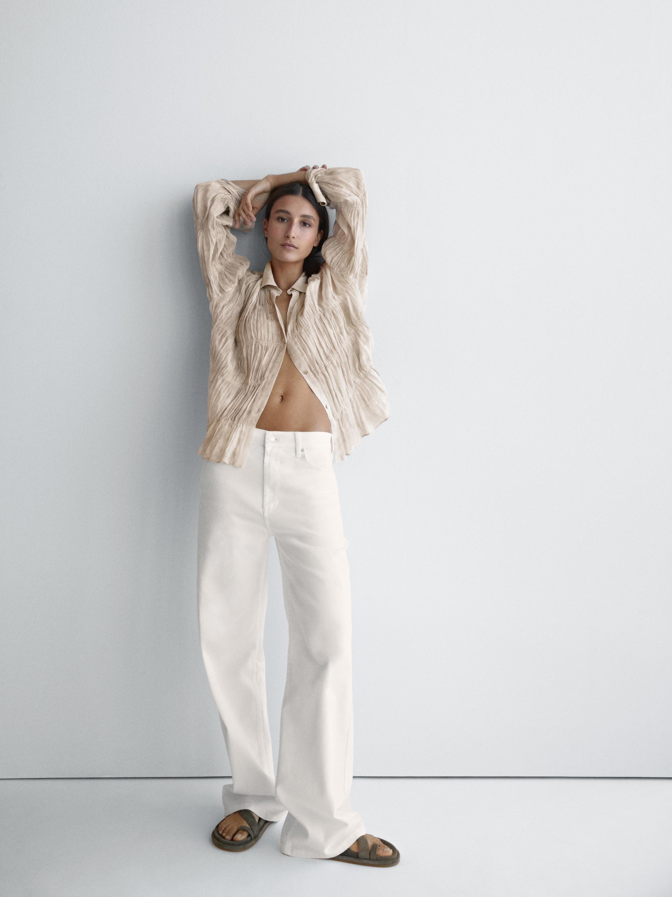 Flowing shirt with gathered details