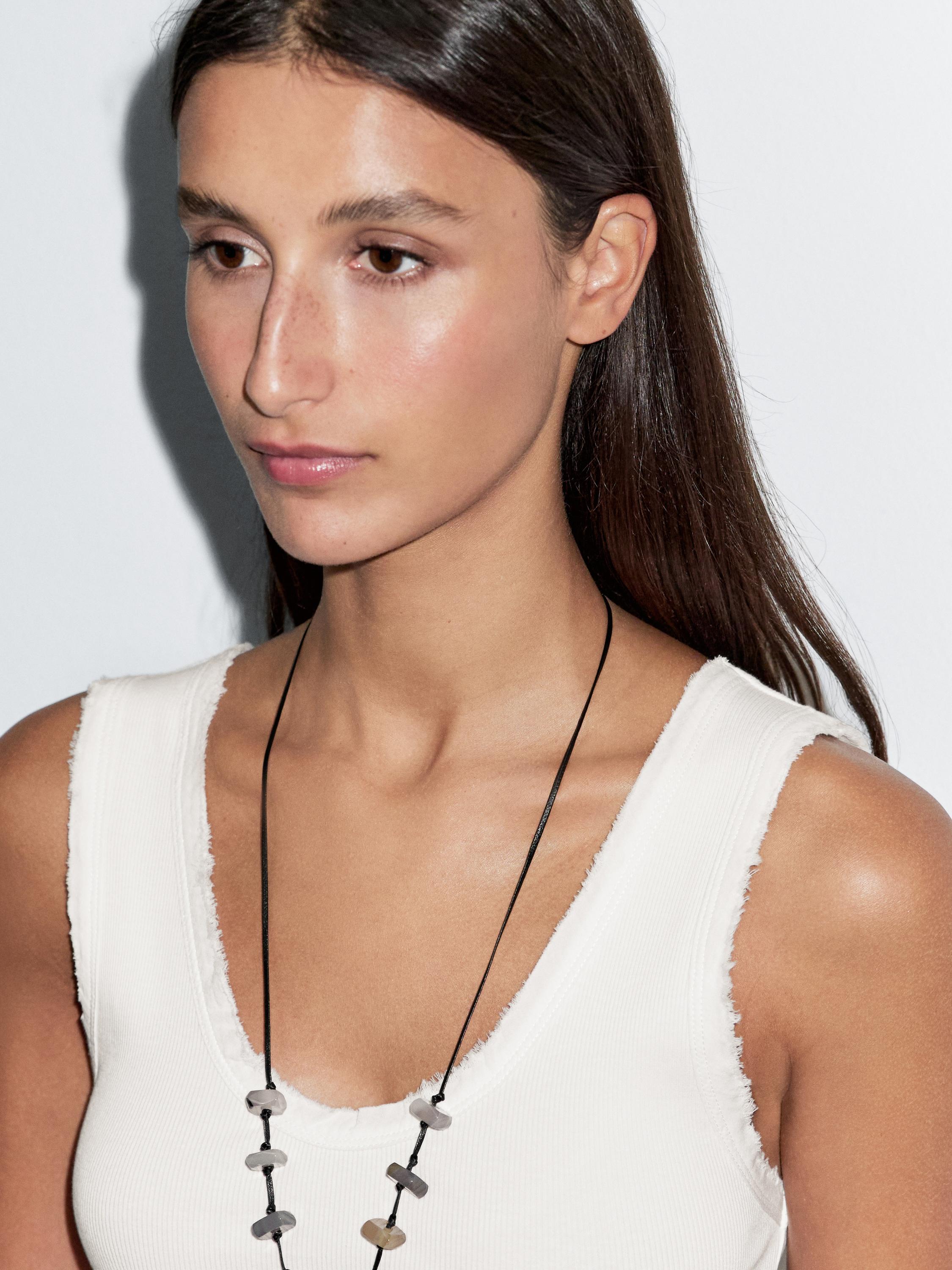 Top z mieszanki bawełny z wystrzępionym obszyciem