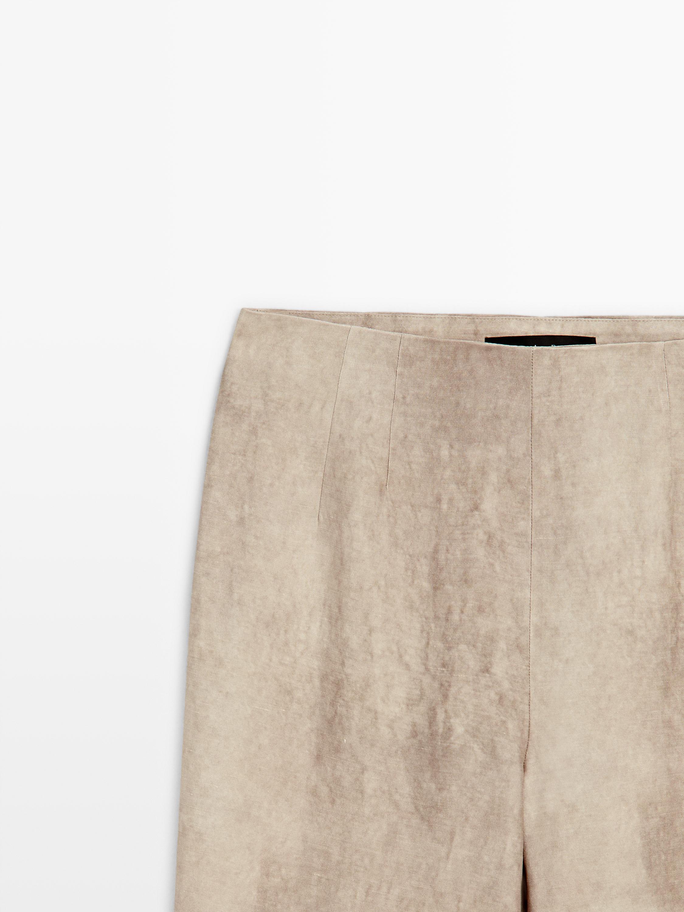 Distressed-effect flowing trousers — STONE
