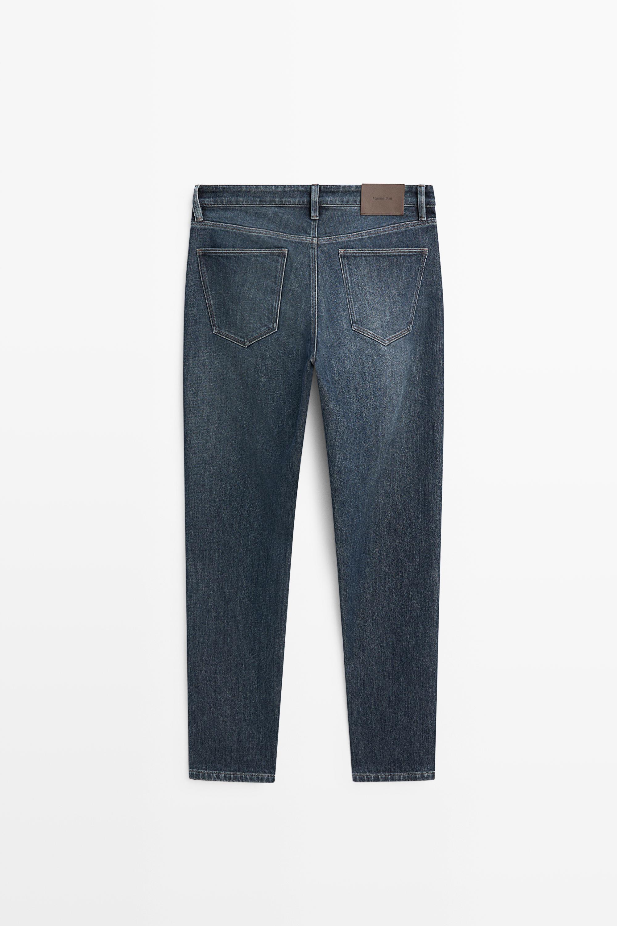 Enzymatic tapered fit jeans — DEEP BLUE