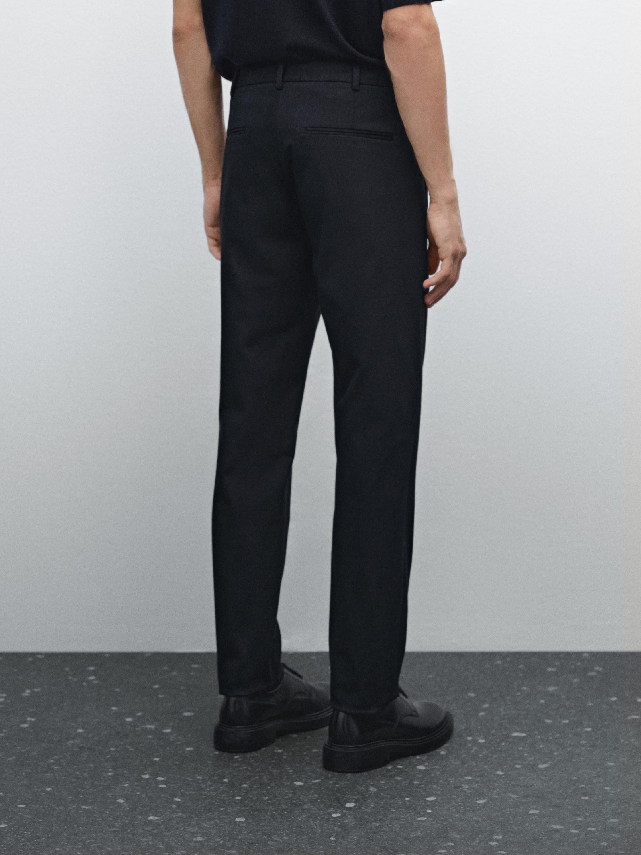 Cotton blend textured slim fit trousers