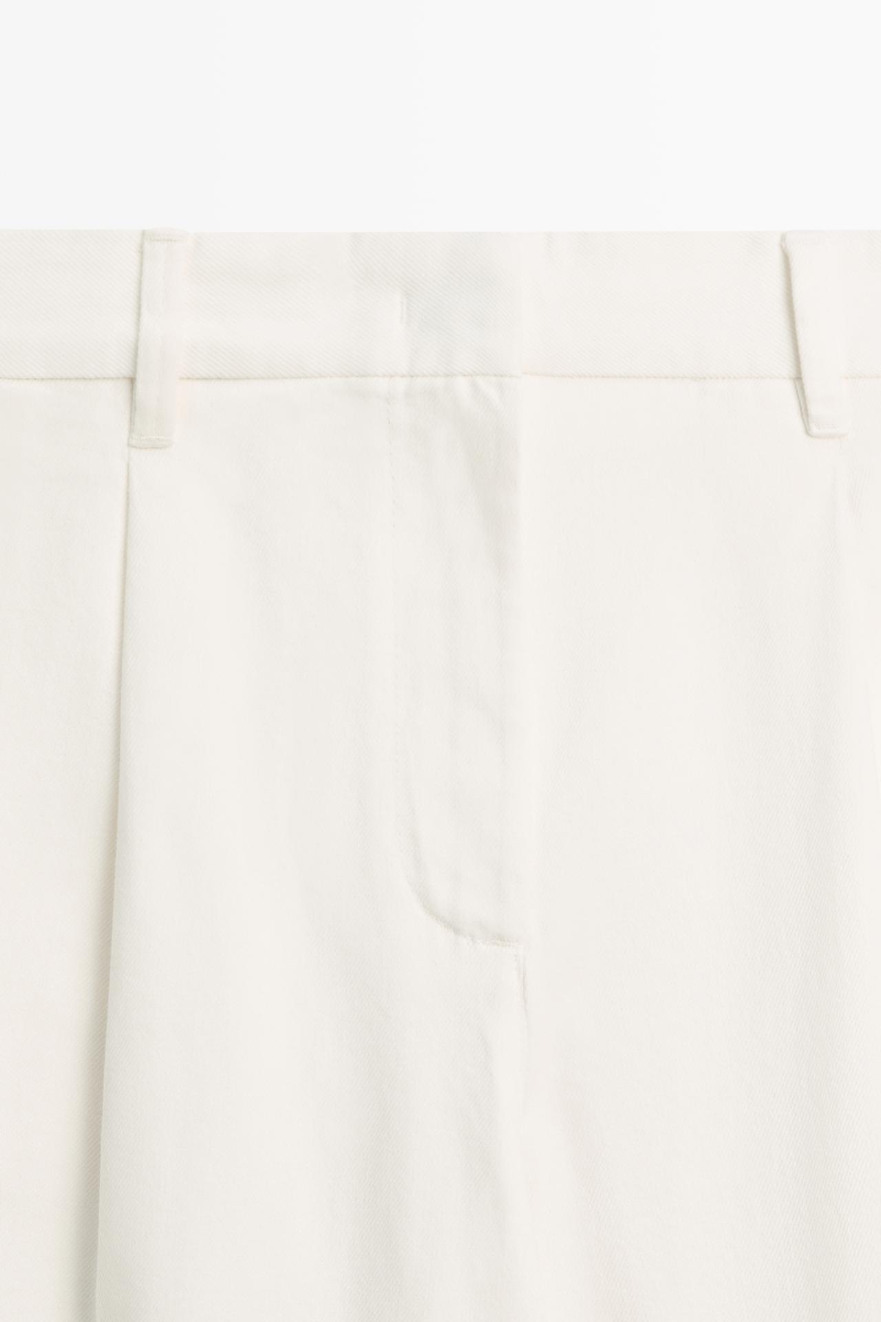 Low-rise pleated wide-leg pants — Off white