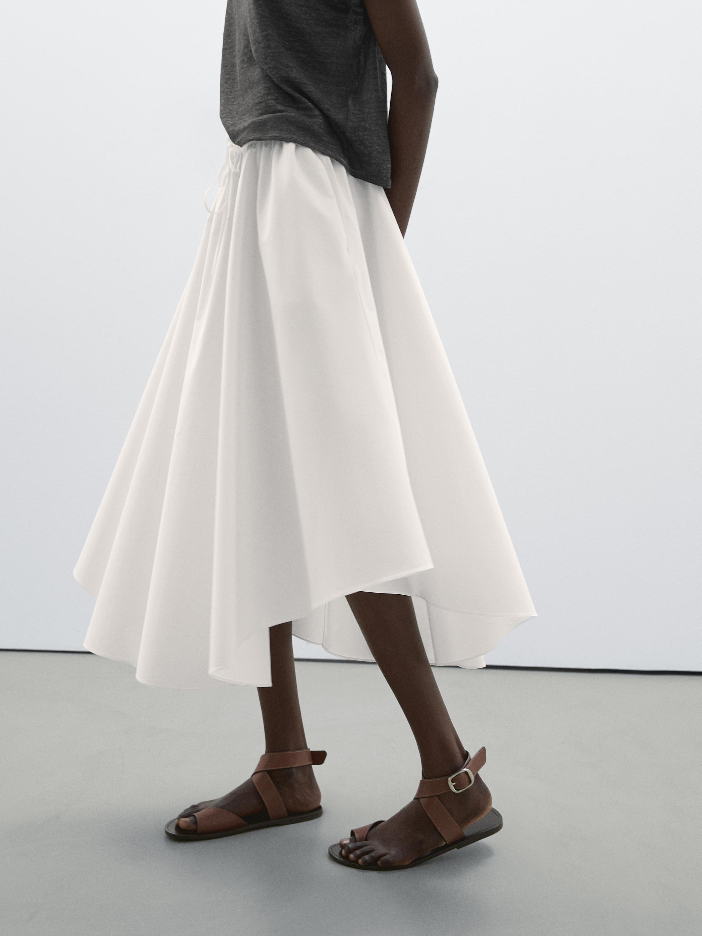Flowing asymmetric midi skirt