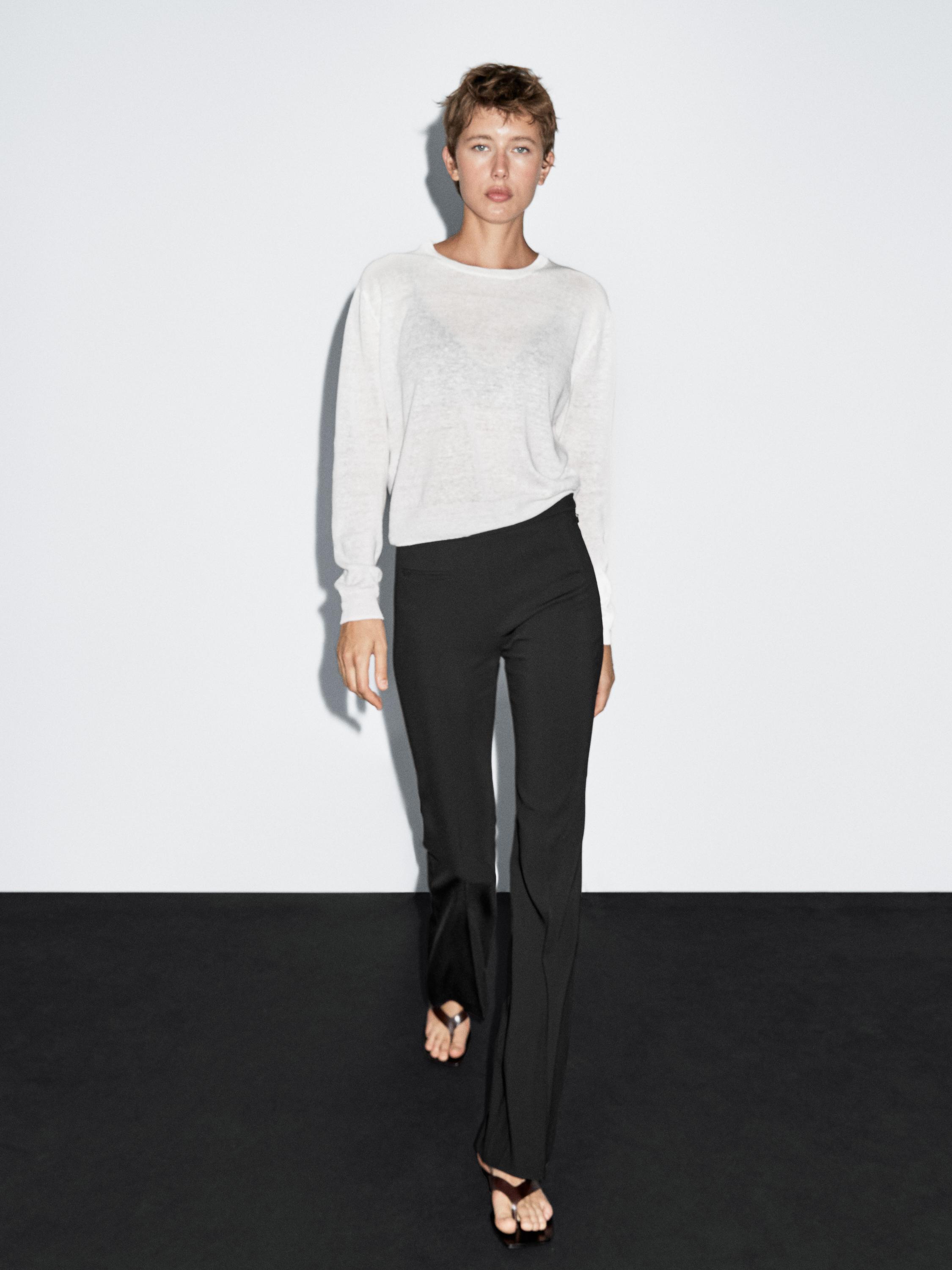 Flared trousers with pocket detail