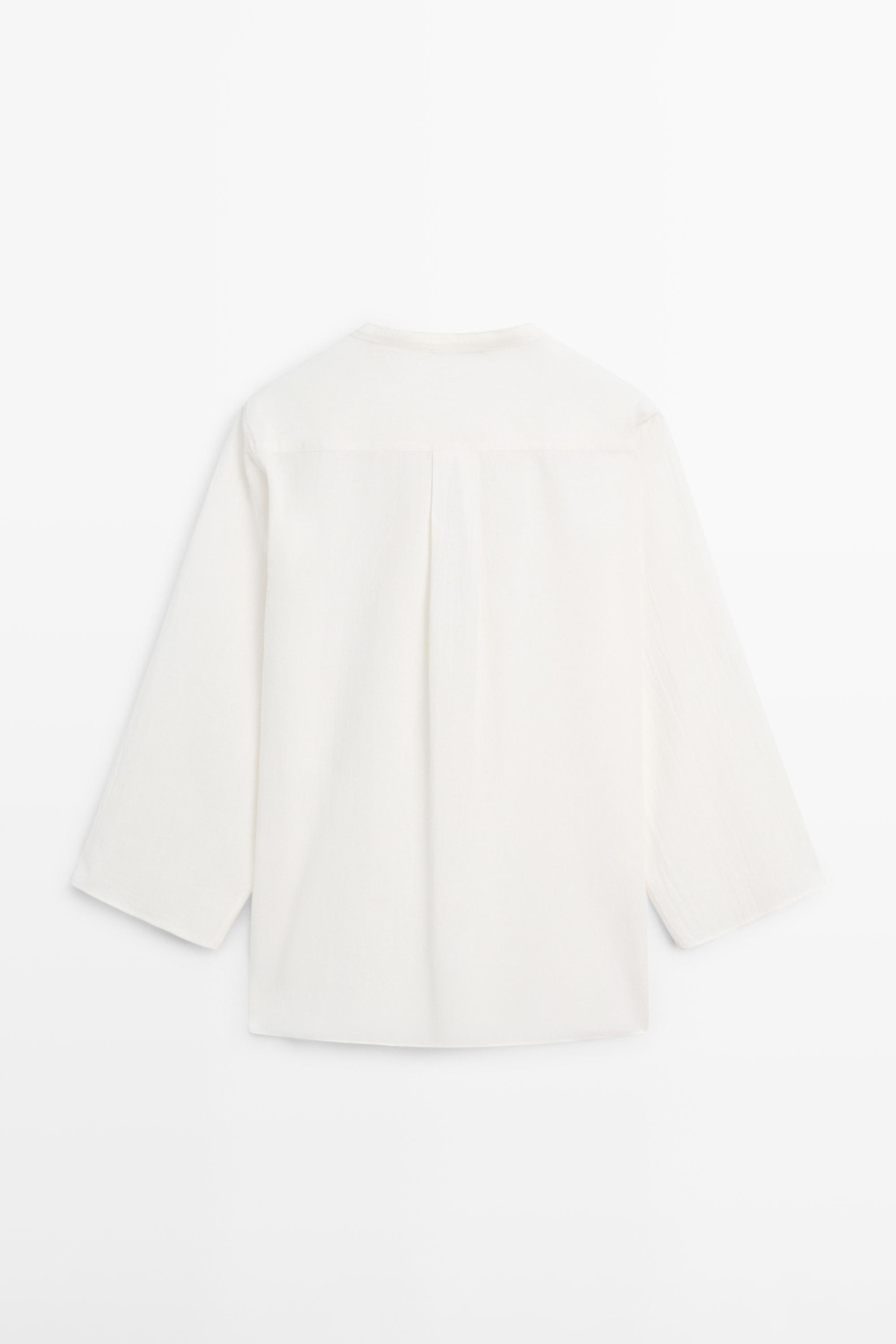 Chemisier fluide col officier détails brodés