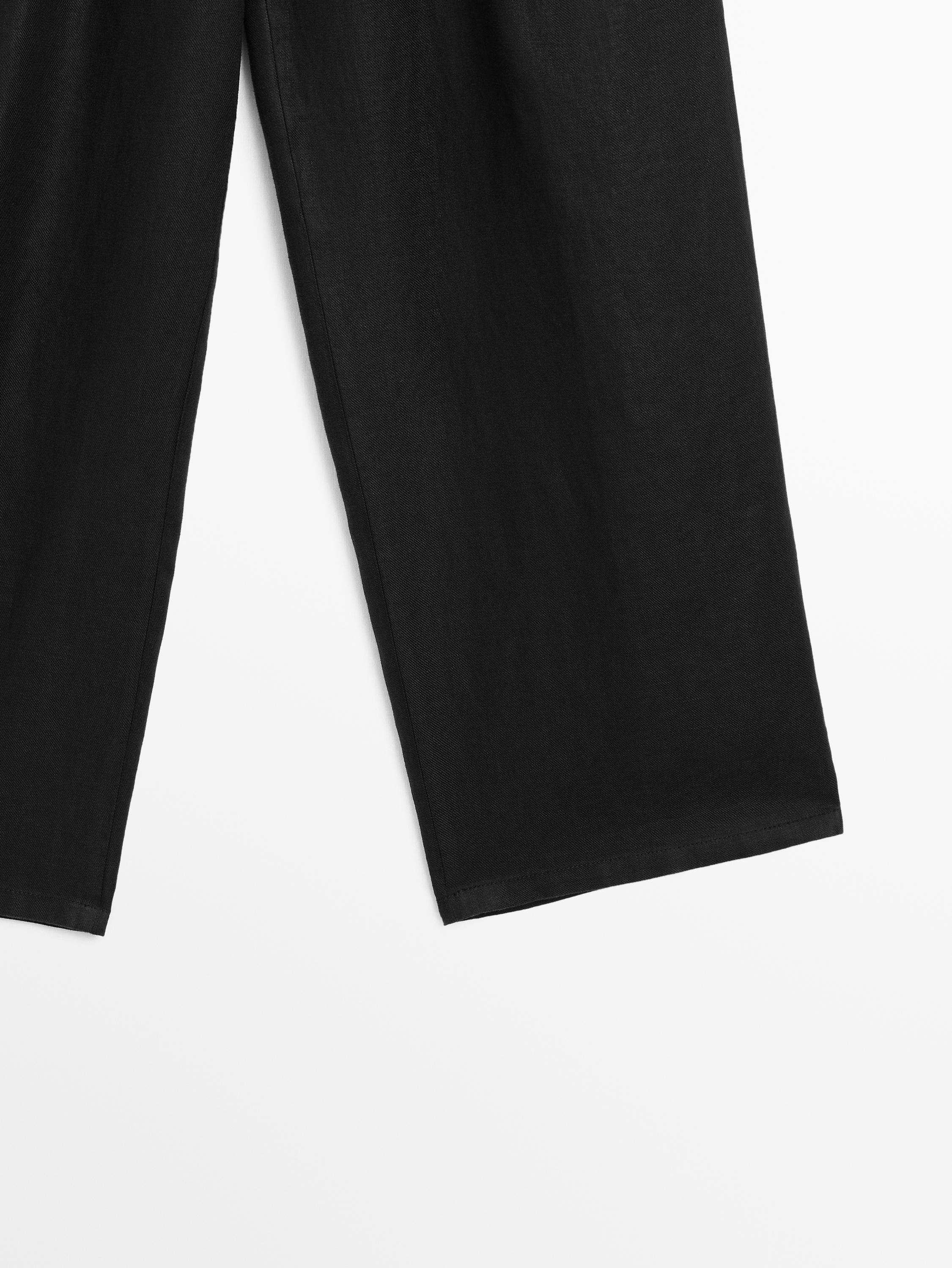 Pantalón tiro medio wide 100% lino