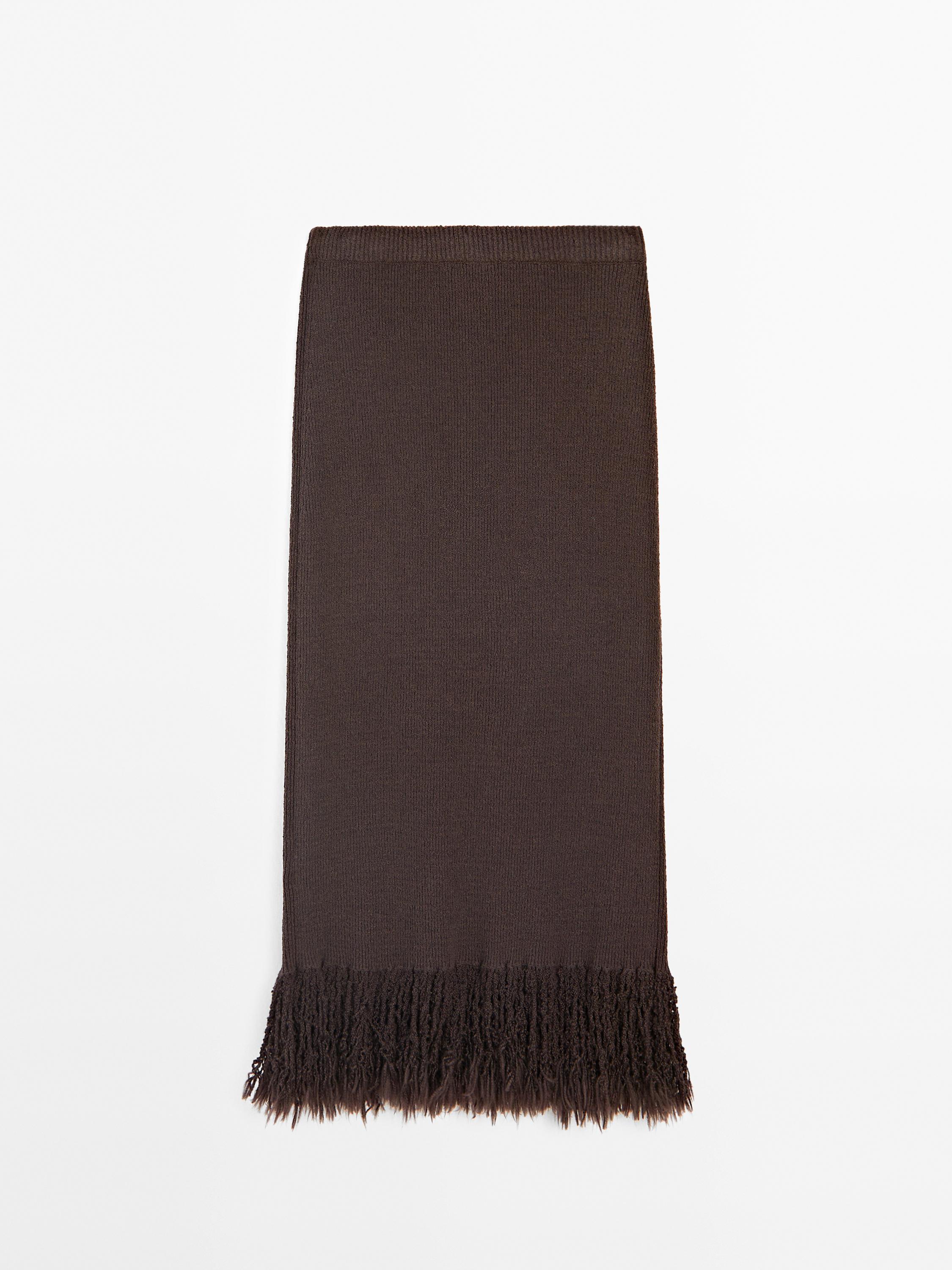 Long knit skirt with fringed hem