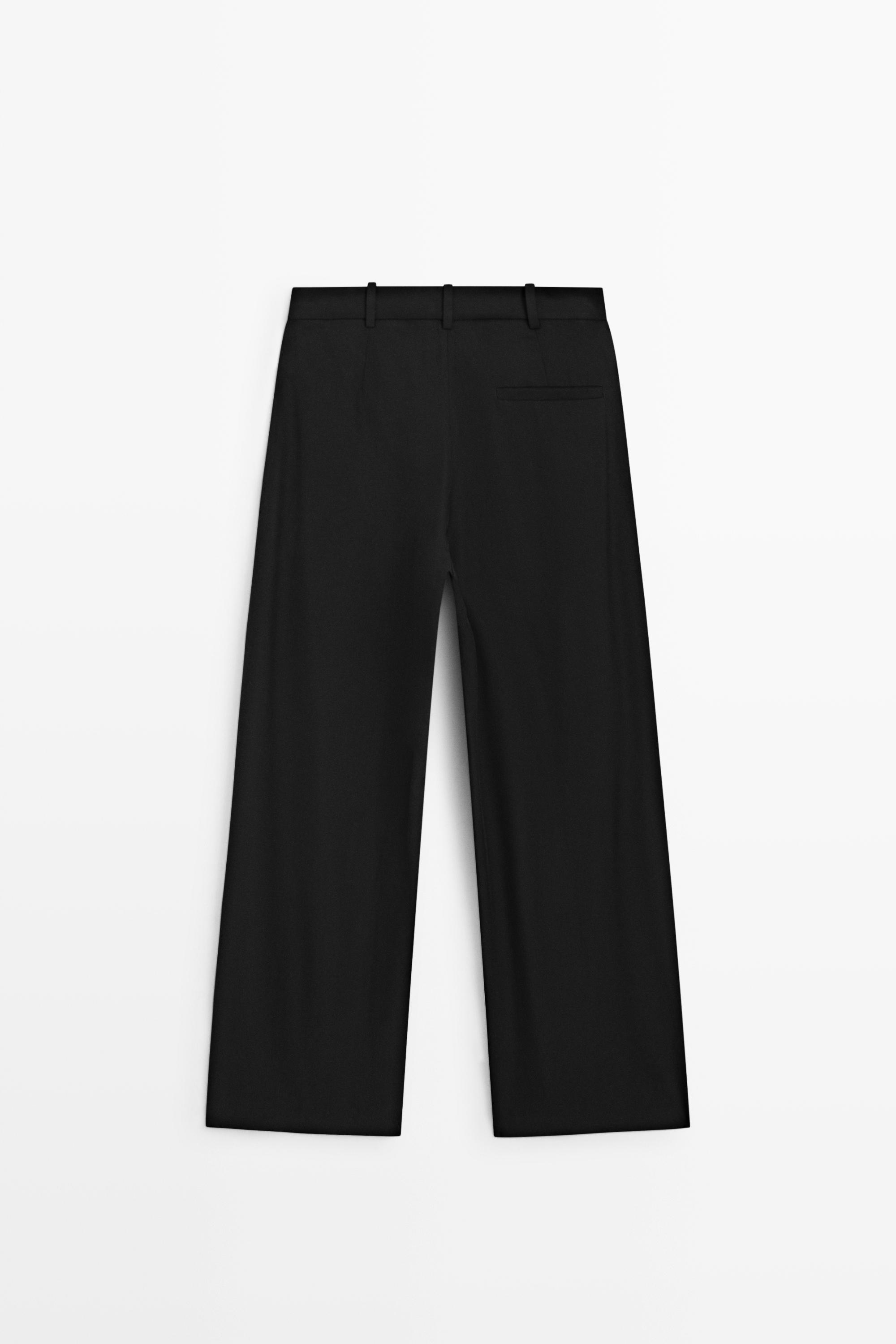 Flowing pleated pants with button detail — BLACK