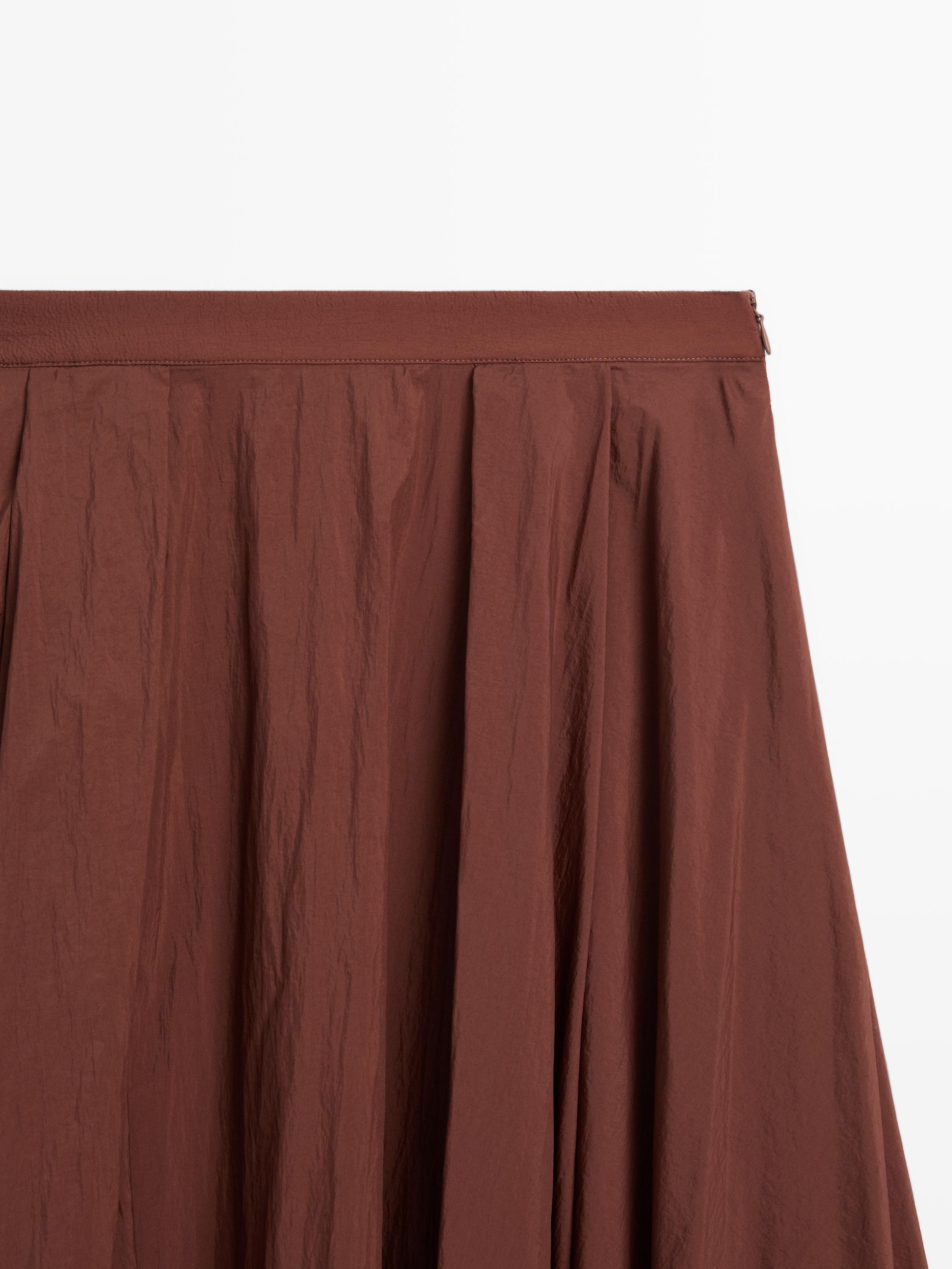 Pleated technical midi skirt
