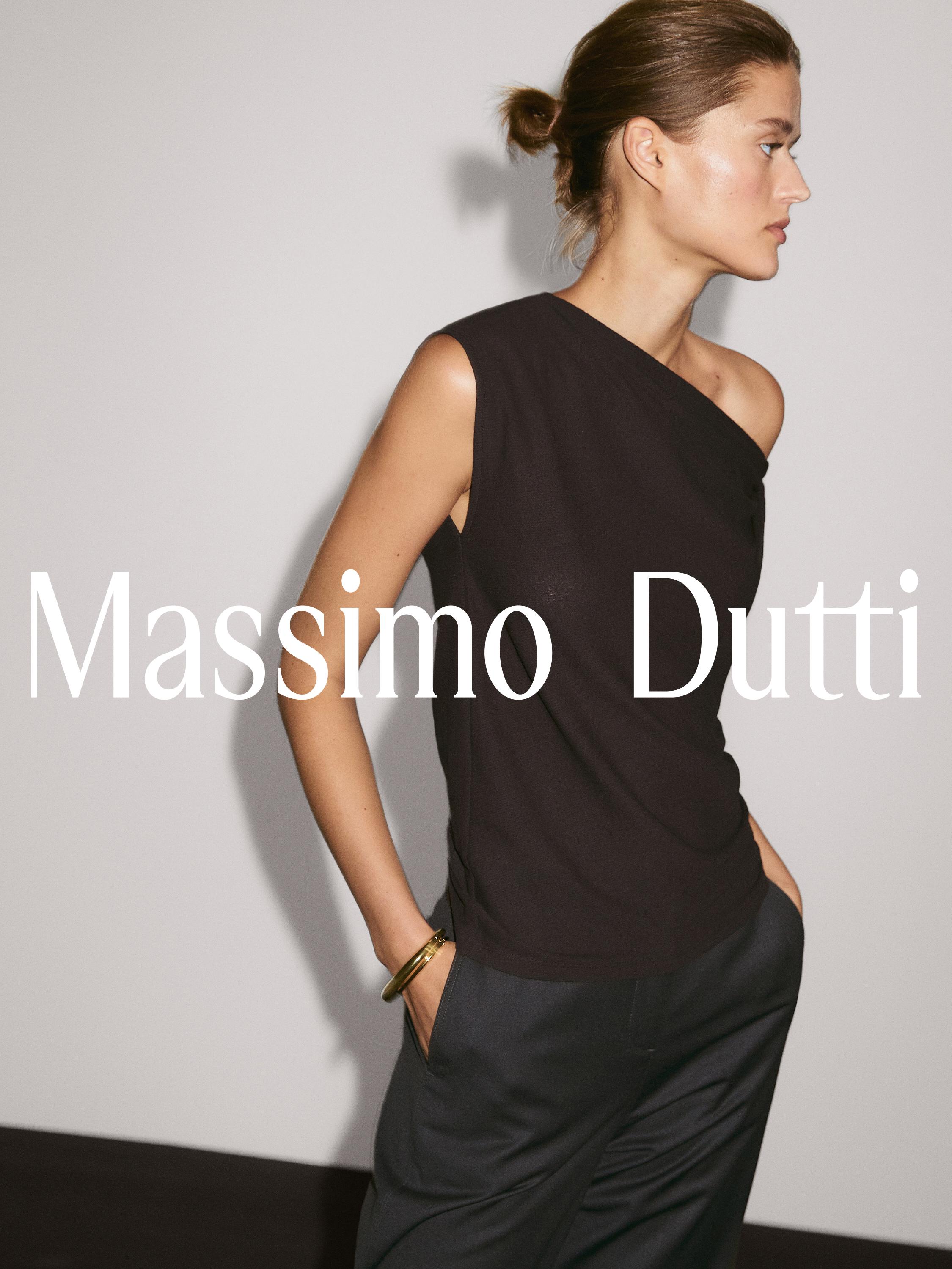Asymmetric top with knot detail