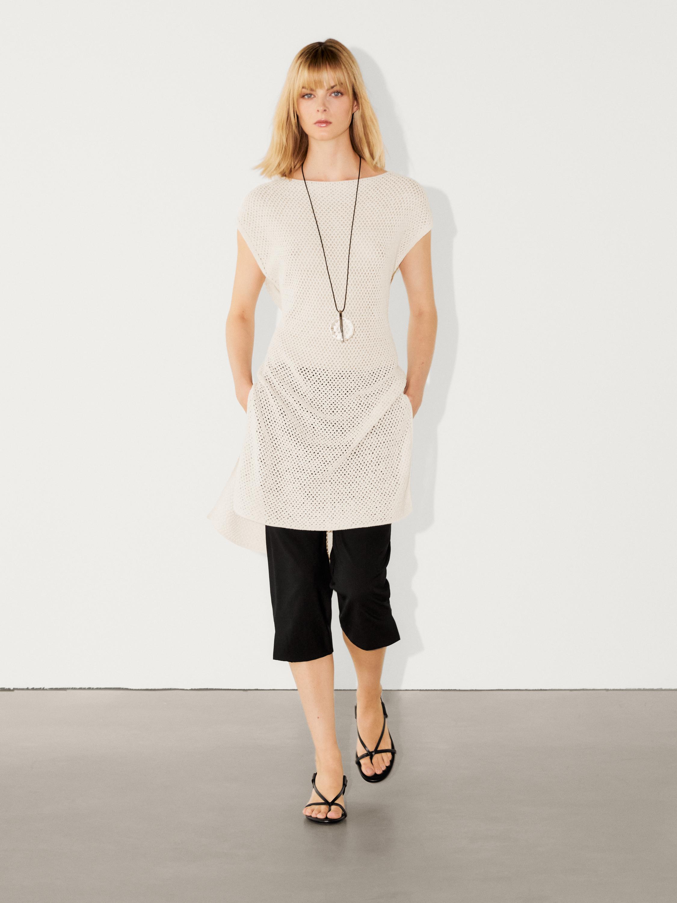 Knit vest with vent details