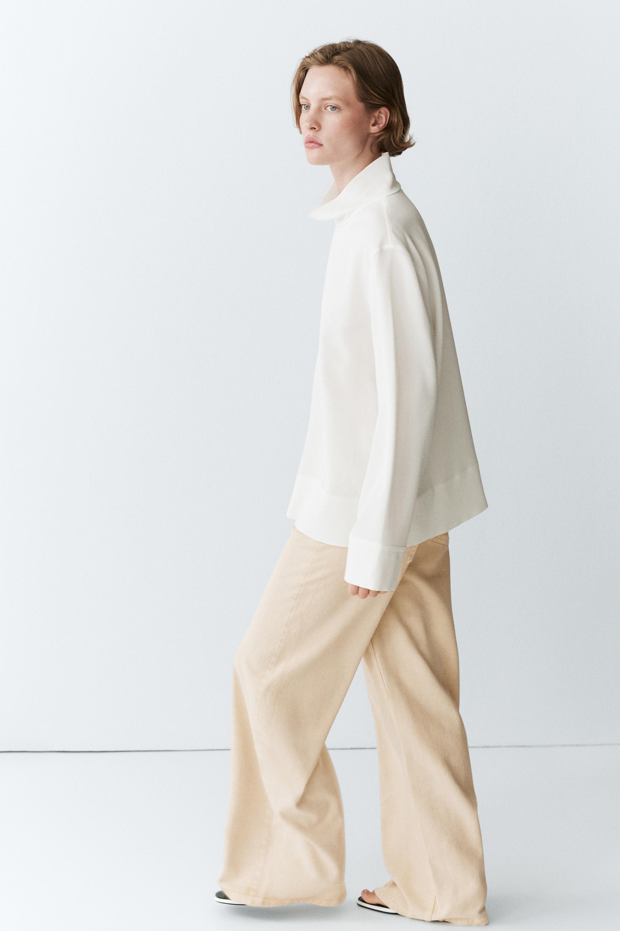 High neck blouse with hem detail — WHITE