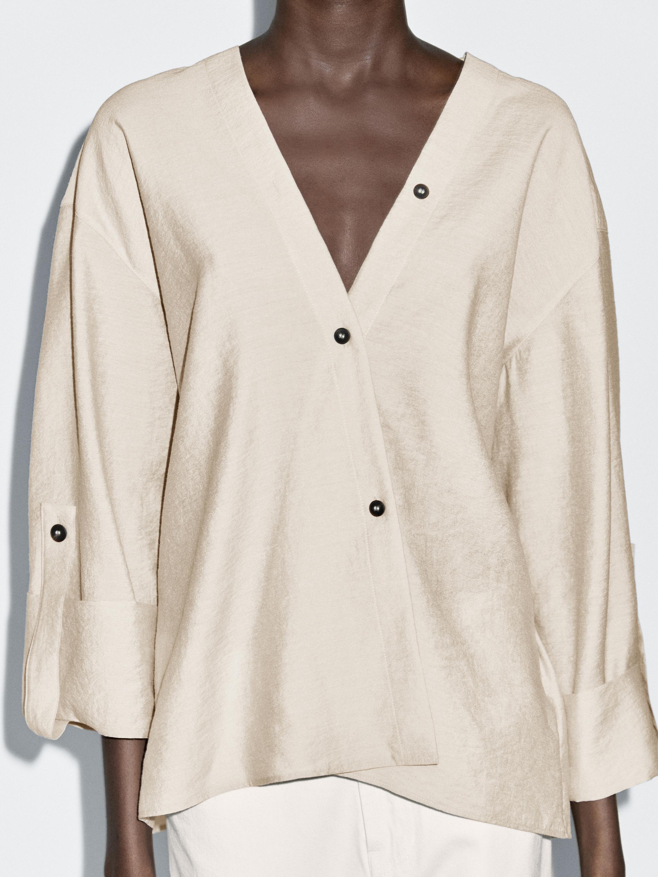 Košulja sa podvrnutim rukavima