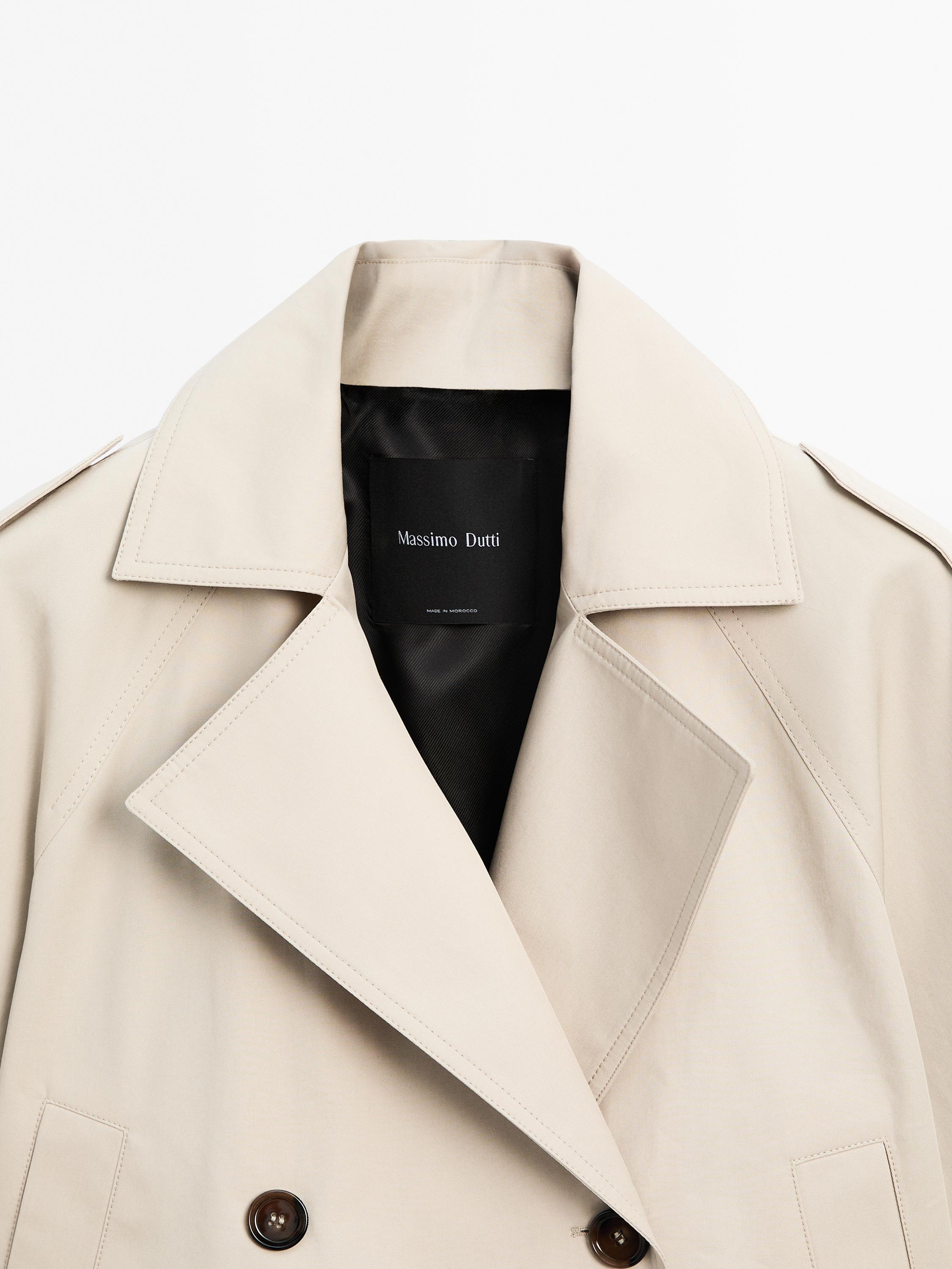 Water-repellent trench coat with lapel collar