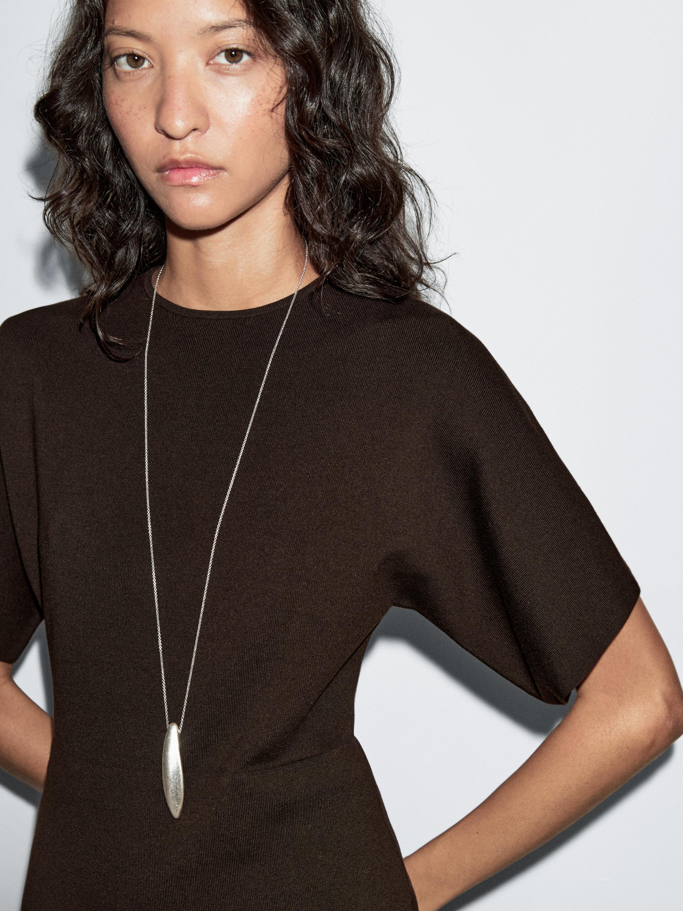 Knit dress with contrast gathered detail