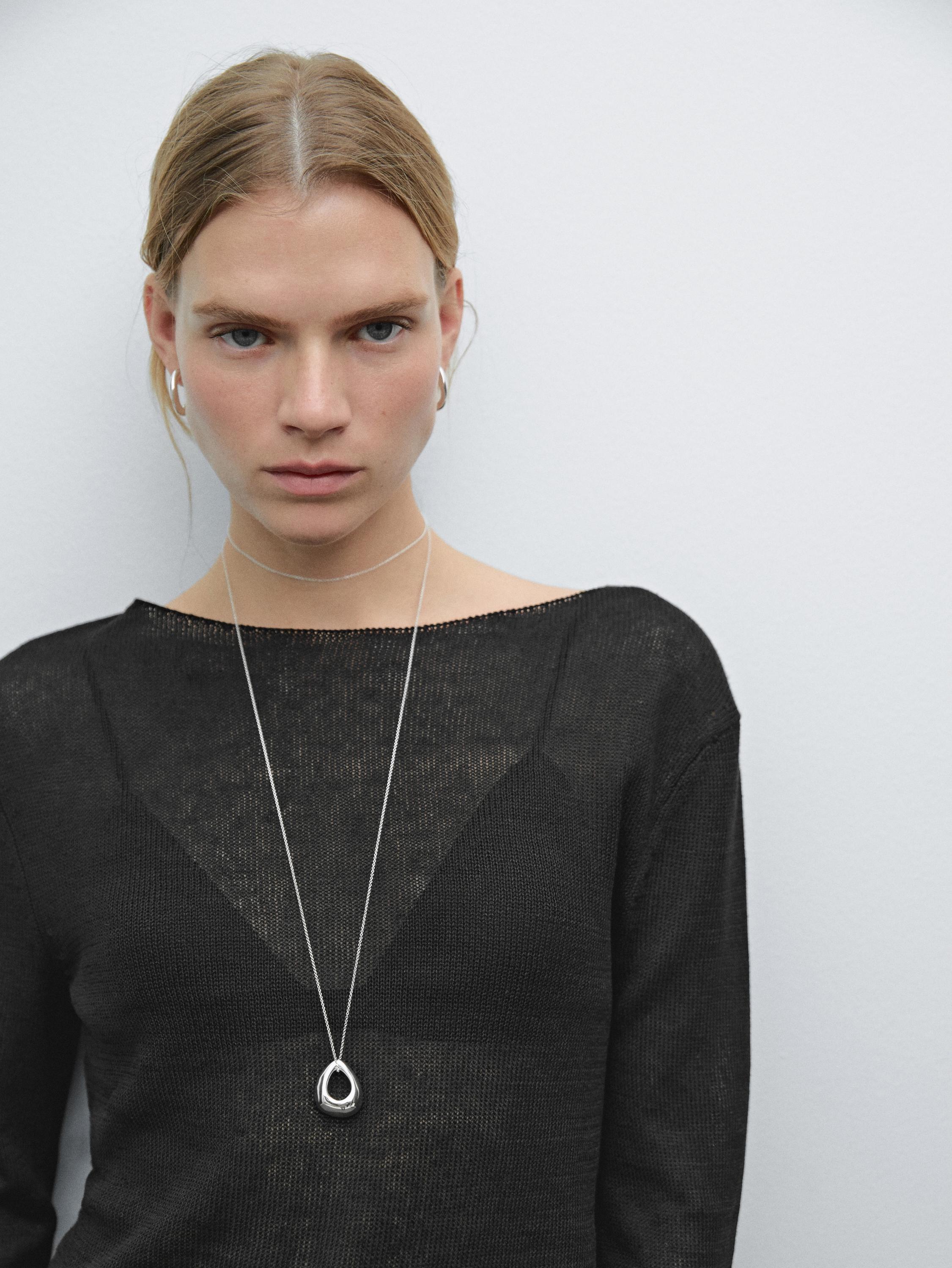 سويتر من الكتان المخلوط بغرزة مخرمة