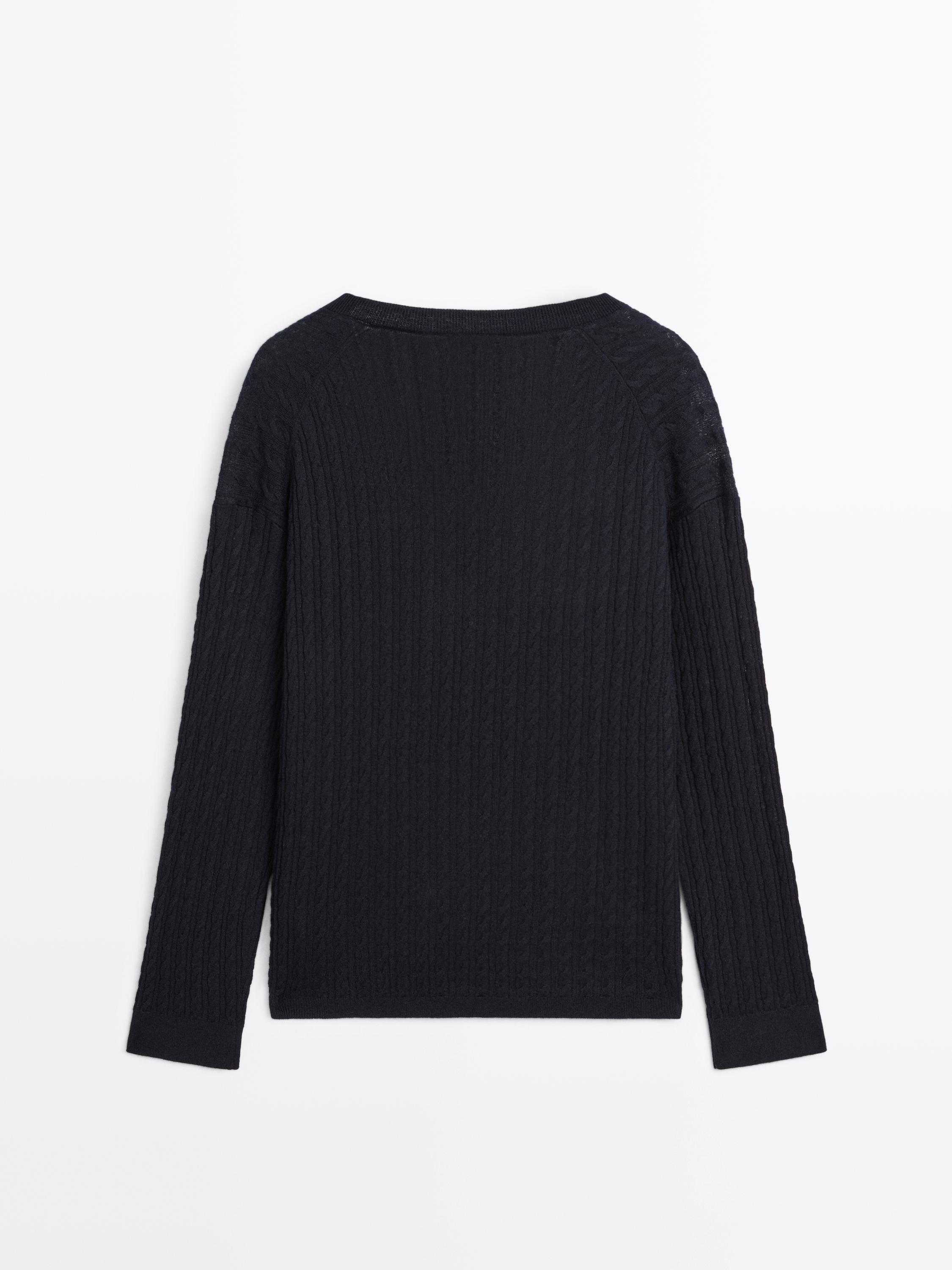 V-neck cable-knit sweater