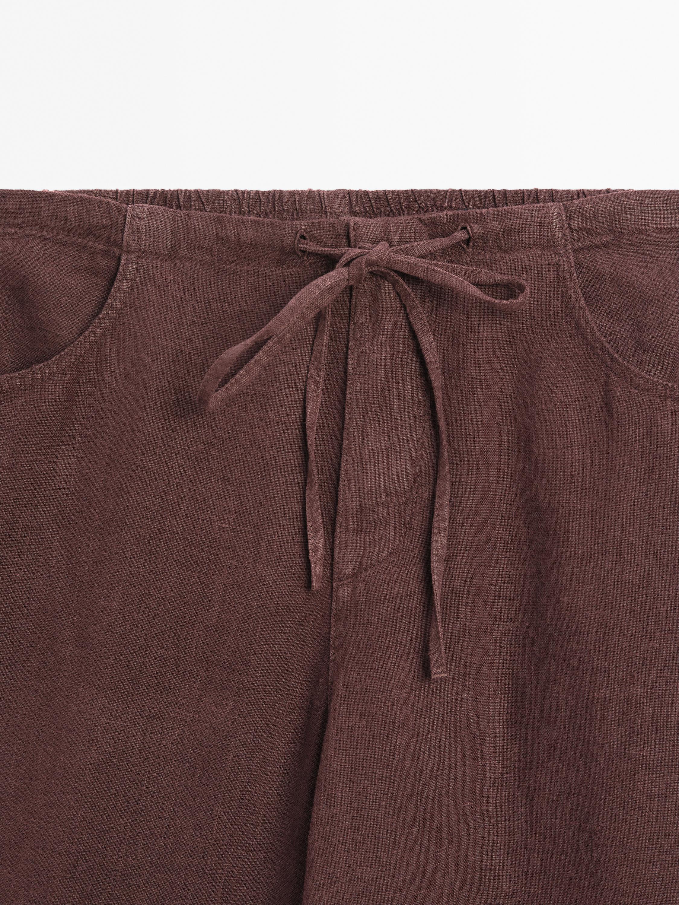 Pantalón recto bolsillos 100% lino