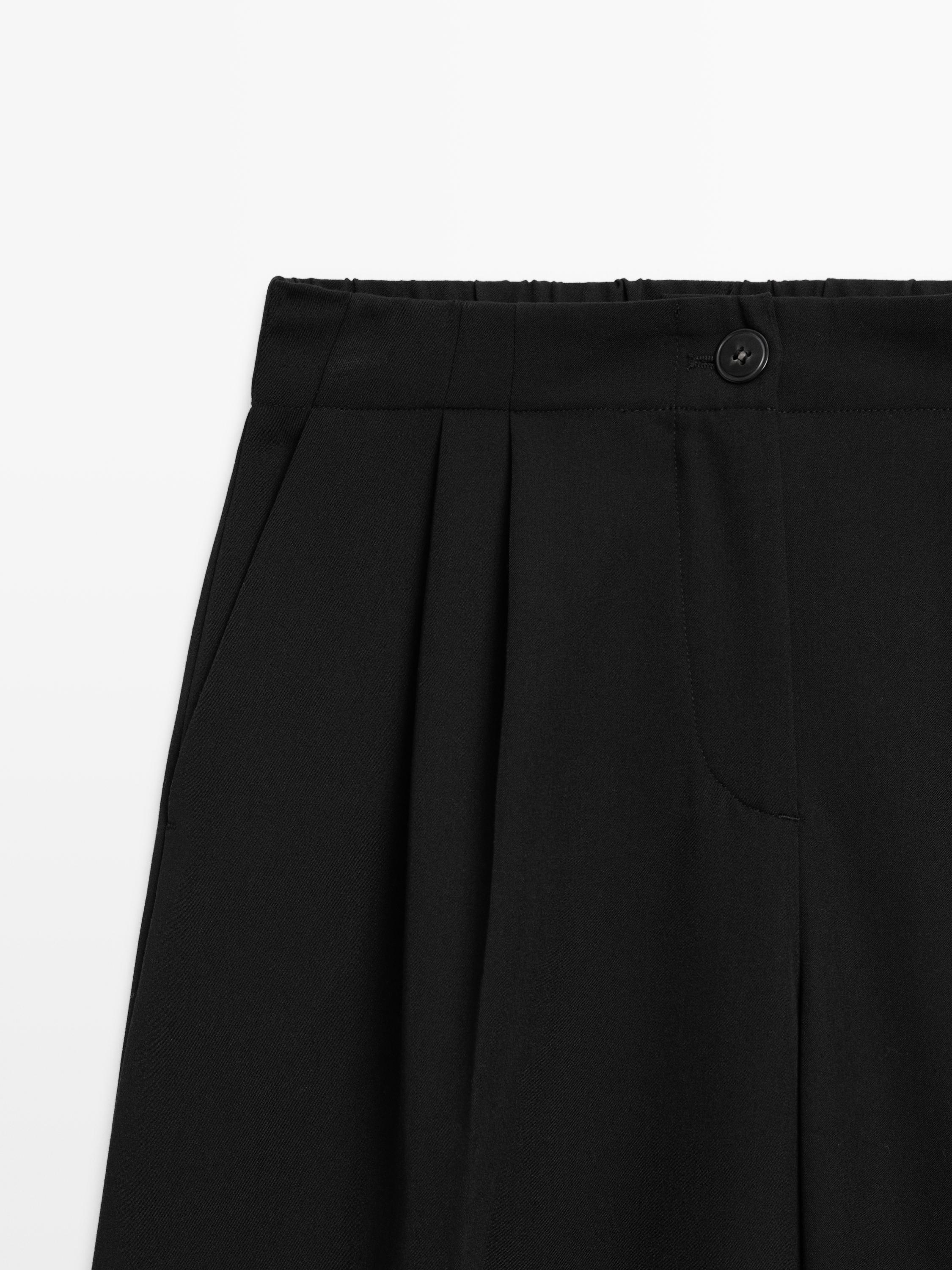 Wide-leg flowing trousers with darts