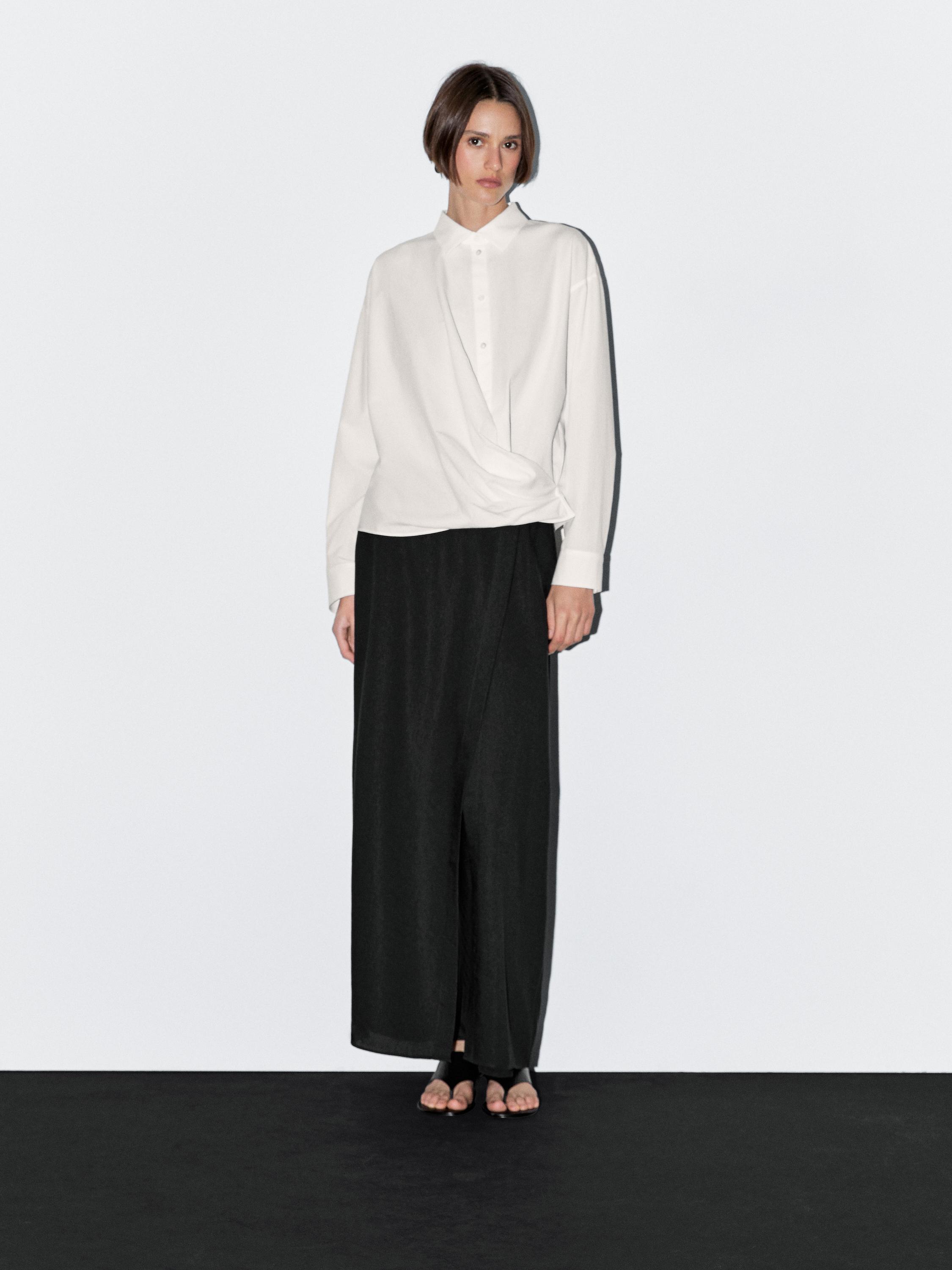 100% cotton shirt with draped asymmetric hem