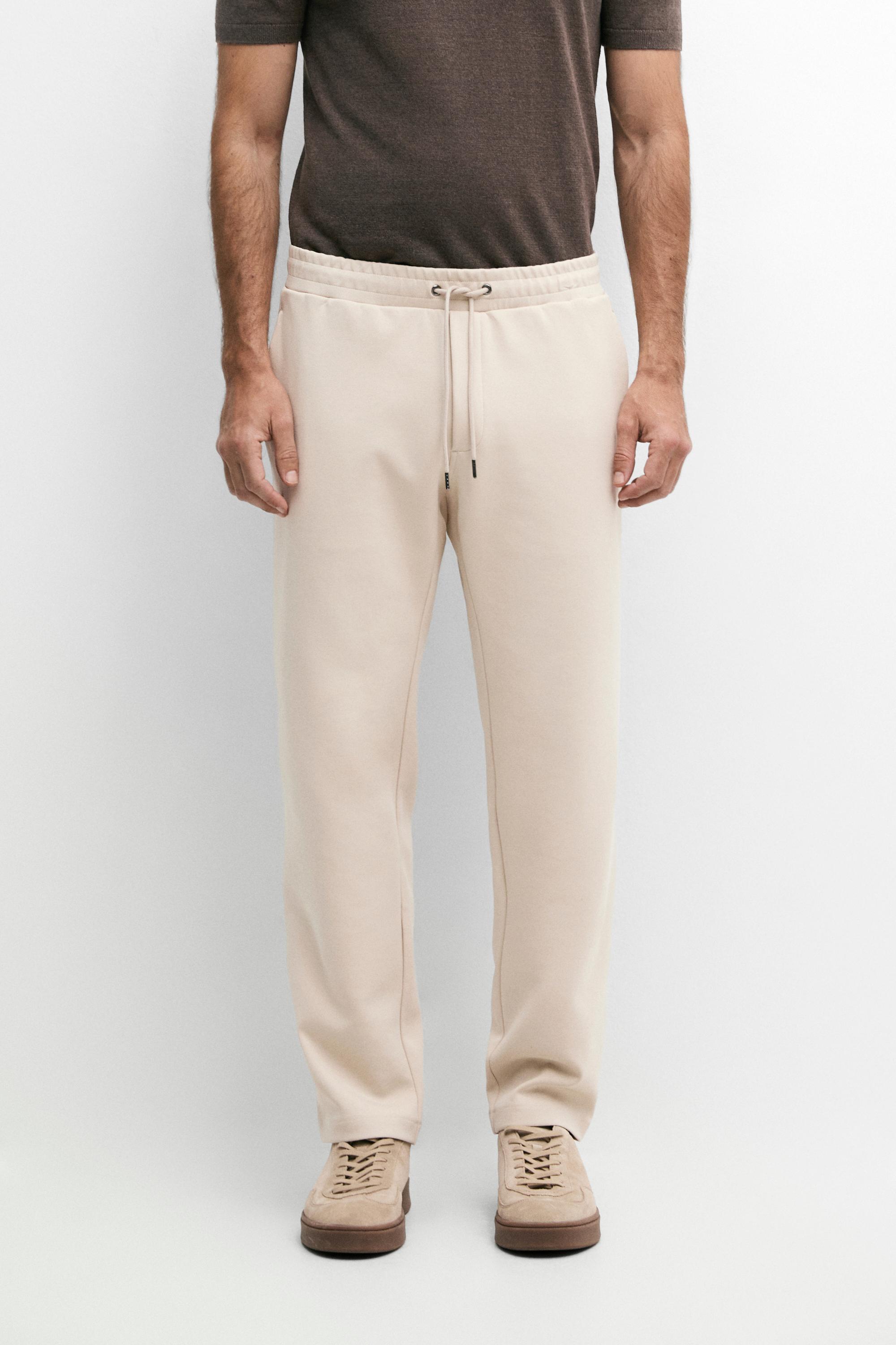 Total look cotton blend jogger fit trousers — Light Beige