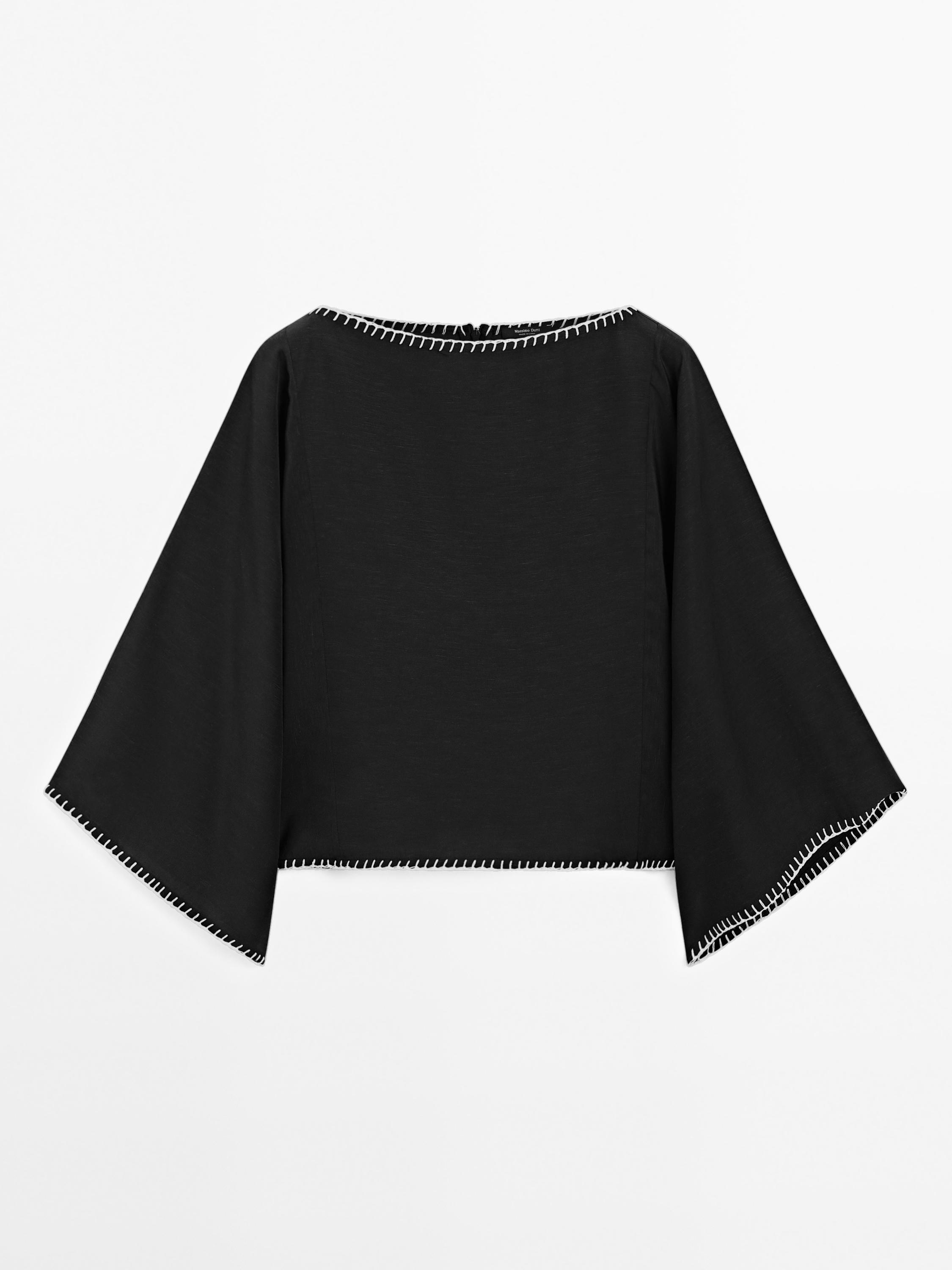 Blusa capa manga murciélago