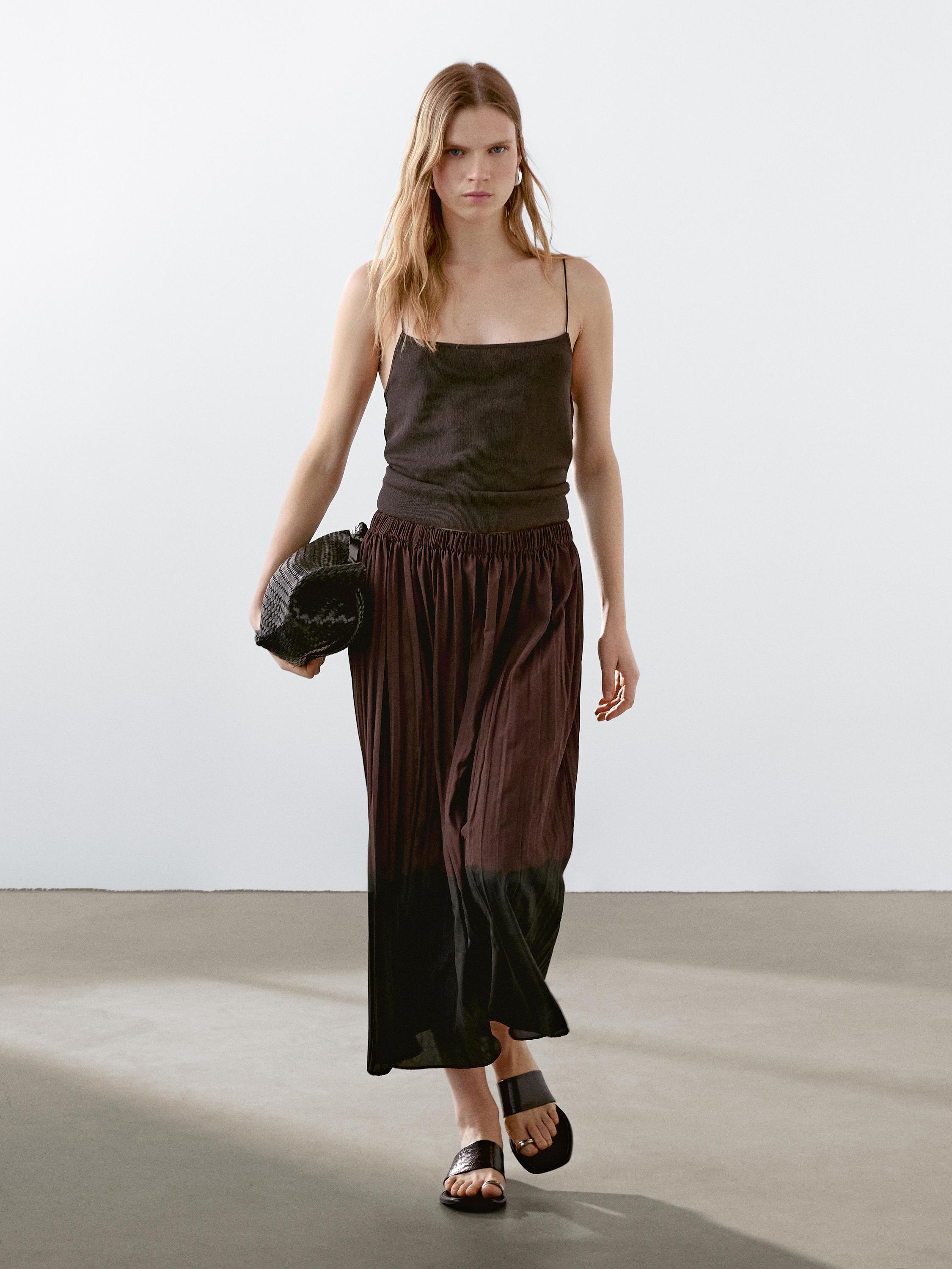 Long flowing pleated skirt