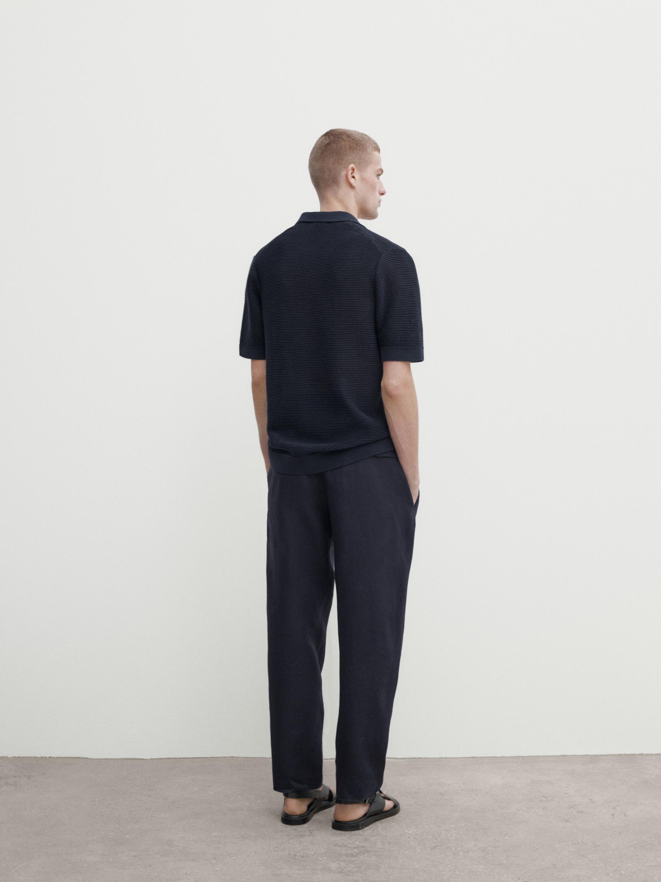 Short sleeve textured knit polo shirt