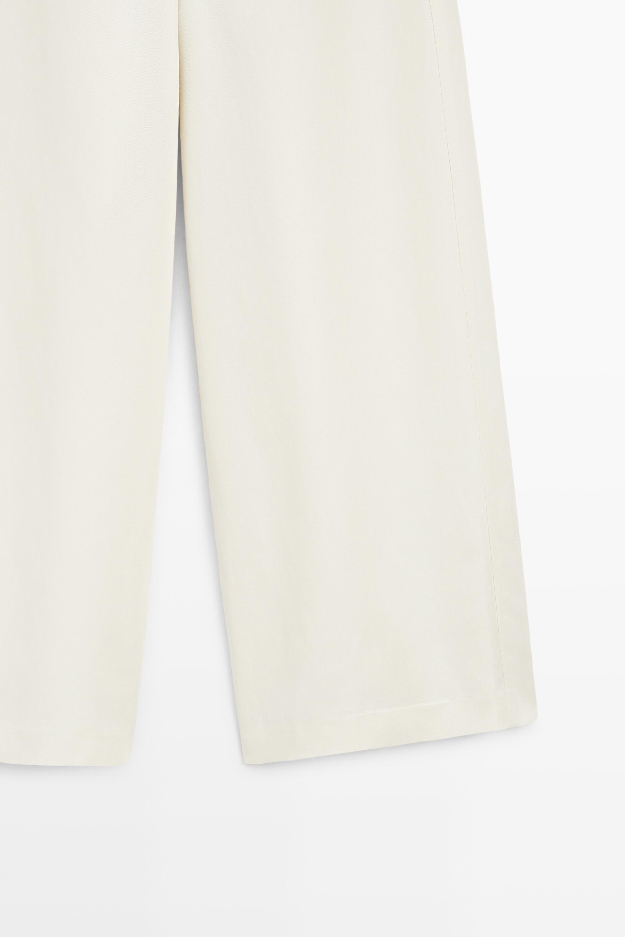 Flowing barrel fit trousers — OFF WHITE
