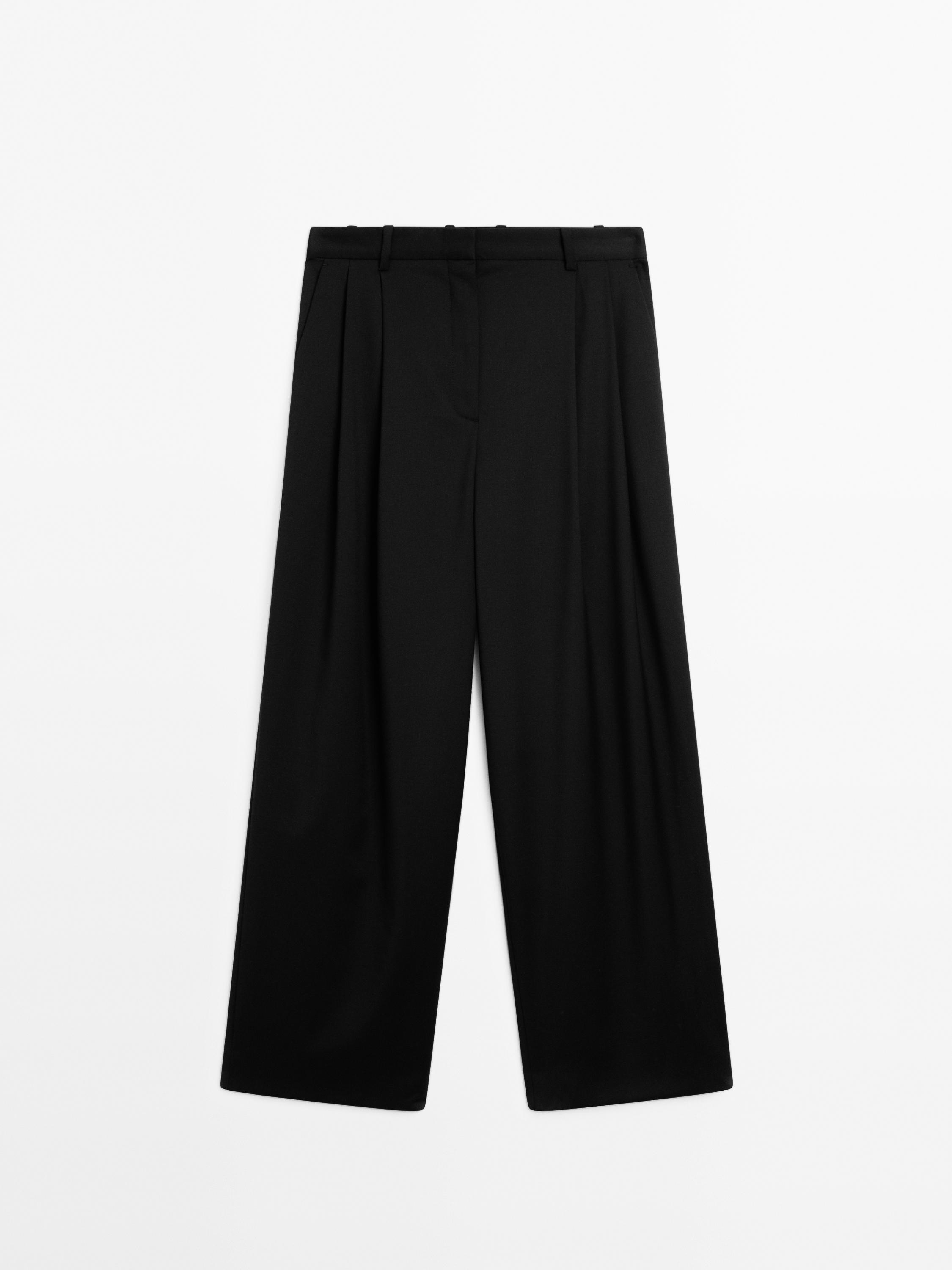 Pleated extra fine wool trousers