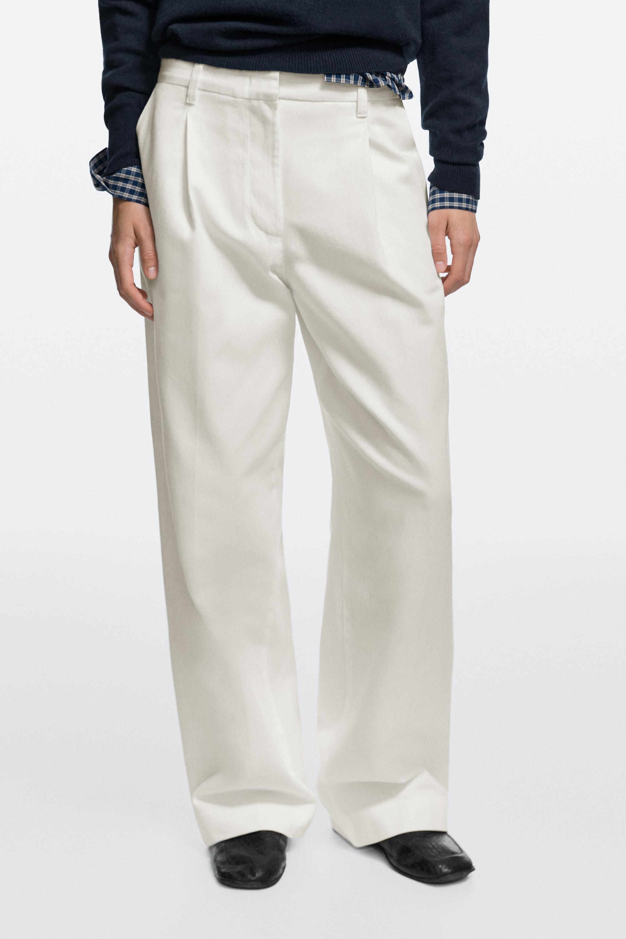 Low-rise wide-leg pleated pants