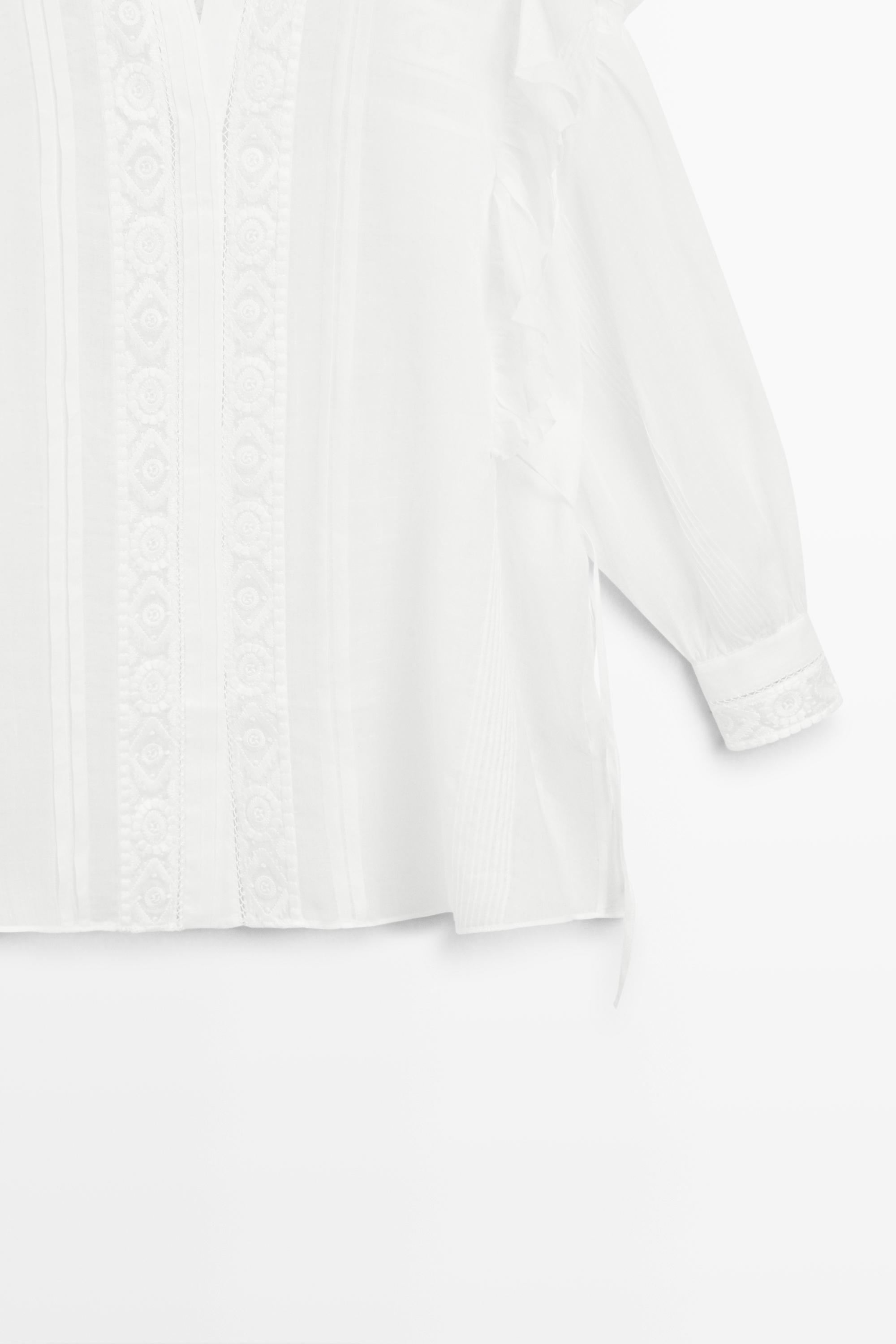 Stand collar blouse with embroidery and ruffles — WHITE
