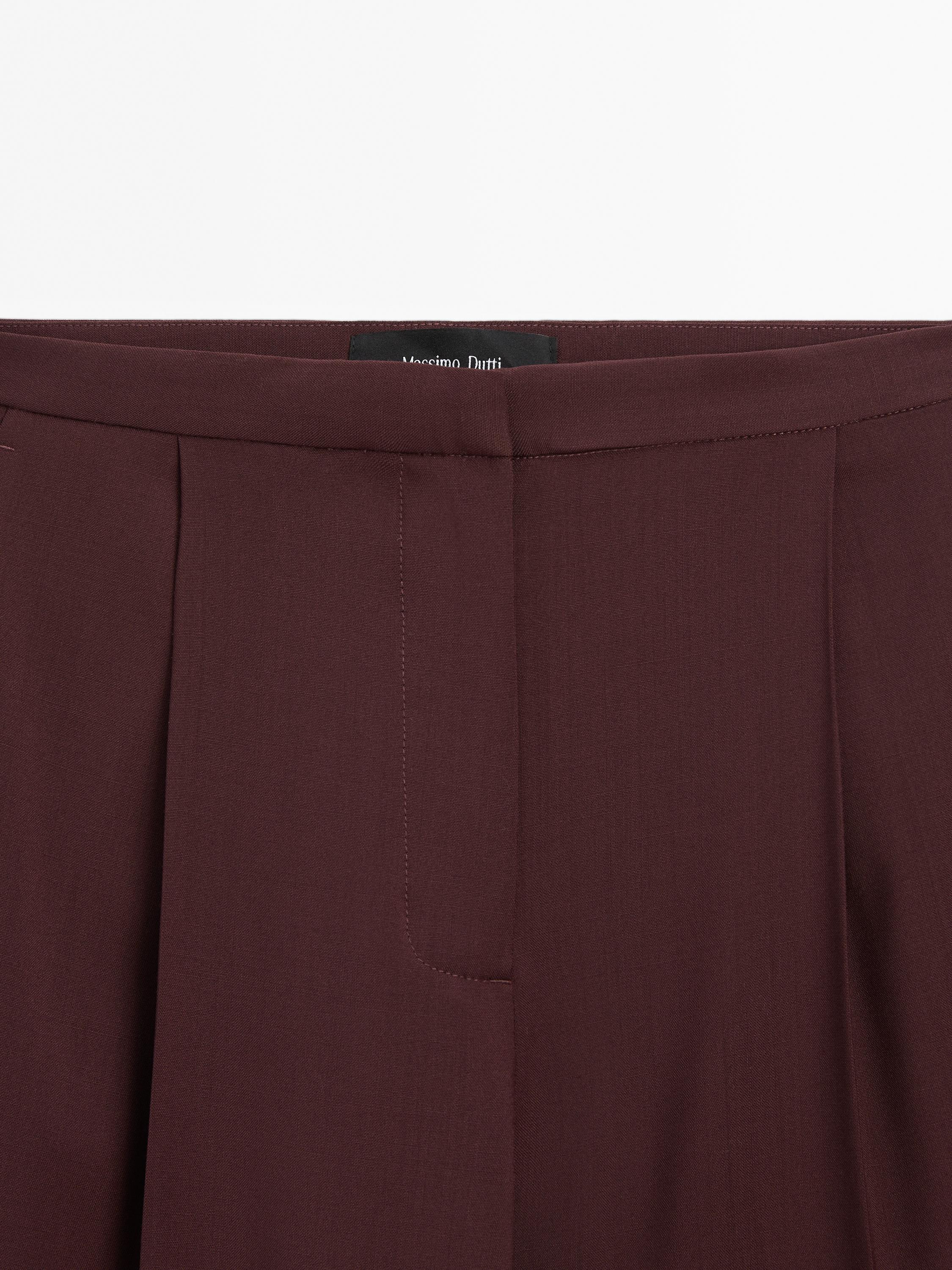 Pantalon à pinces satiné 100 % laine