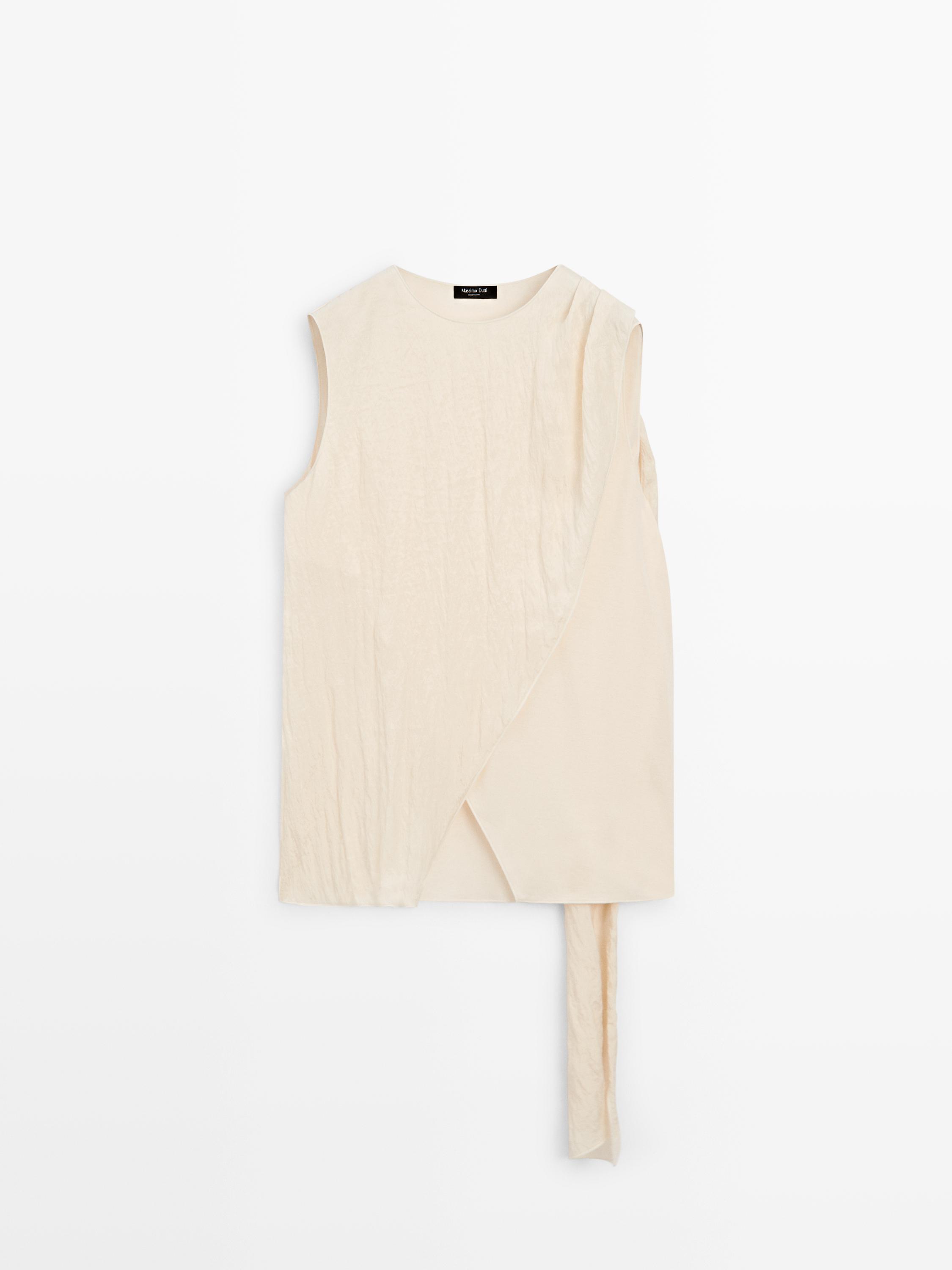 Ruffled top with scarf detail