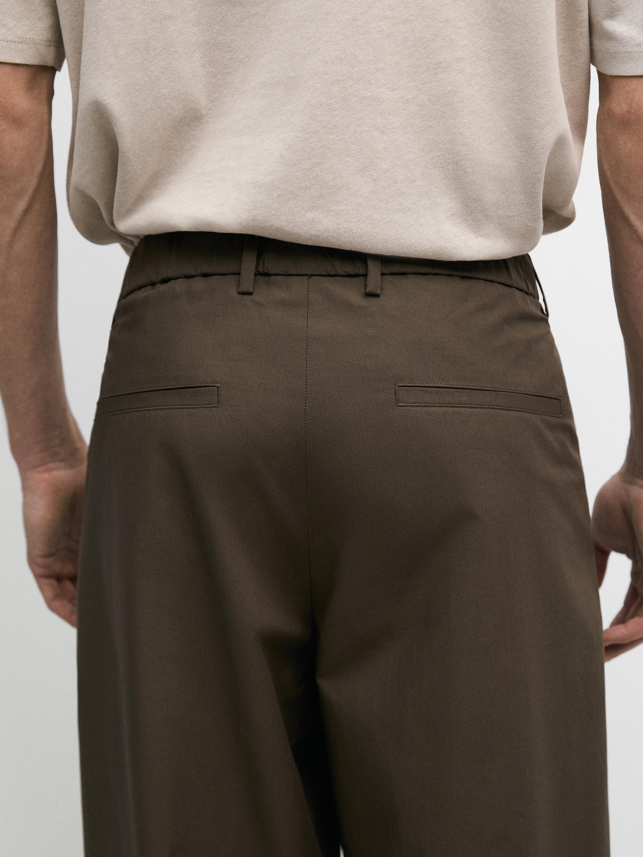 Cotton trousers with double darts — DARK GREEN