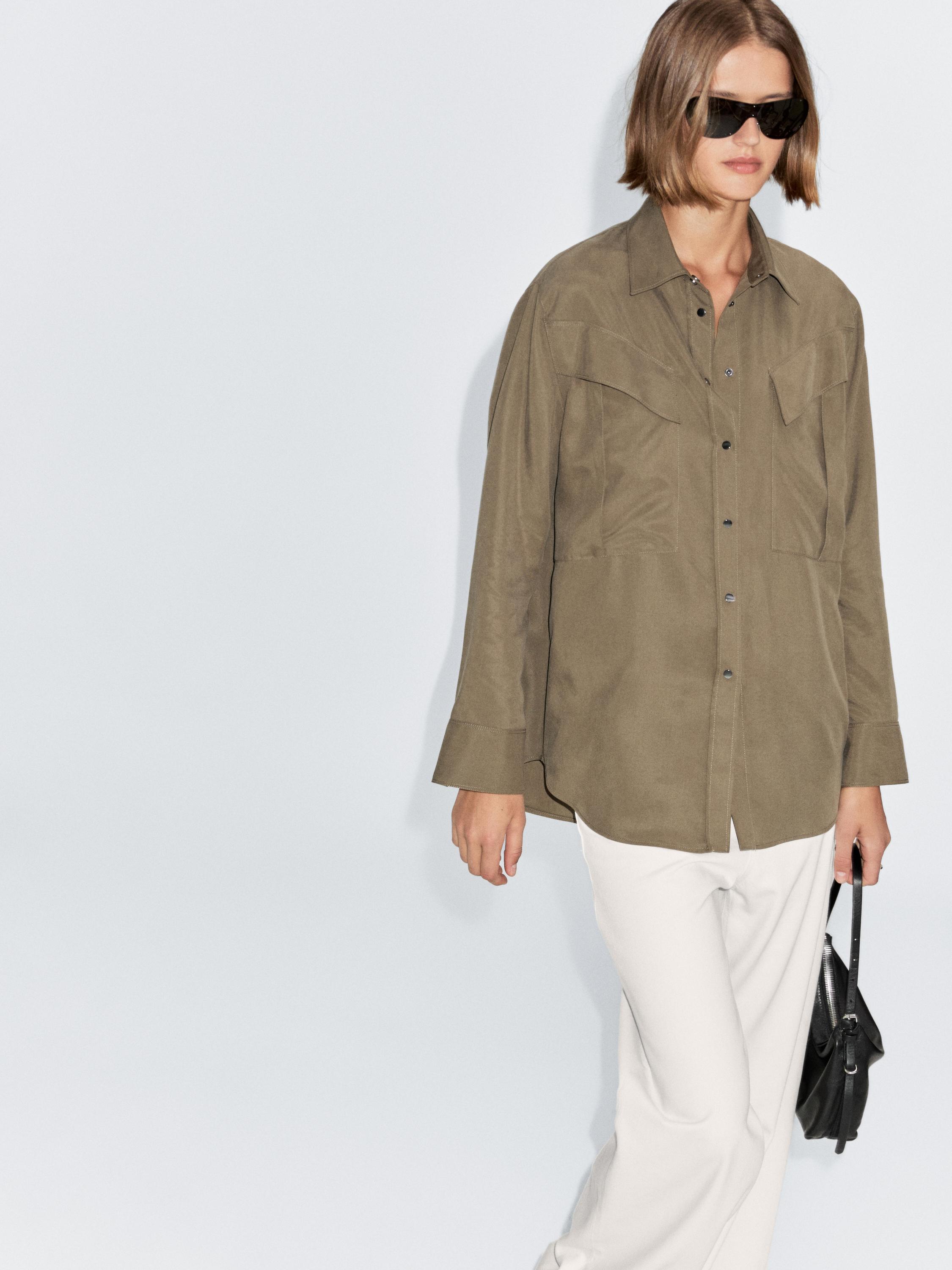 Camicia lunga dettaglio tasche