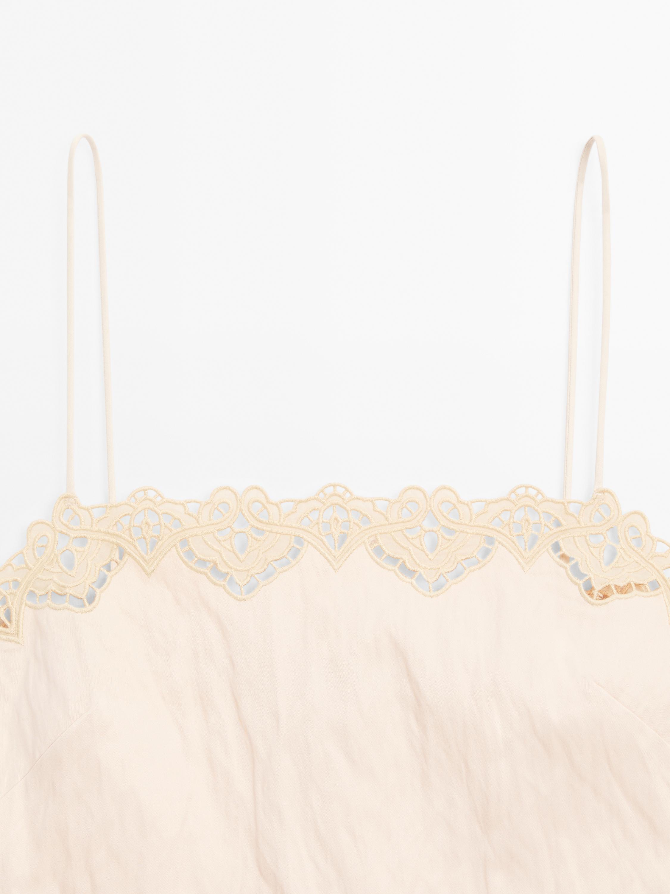 Flowing top with blonde lace detail