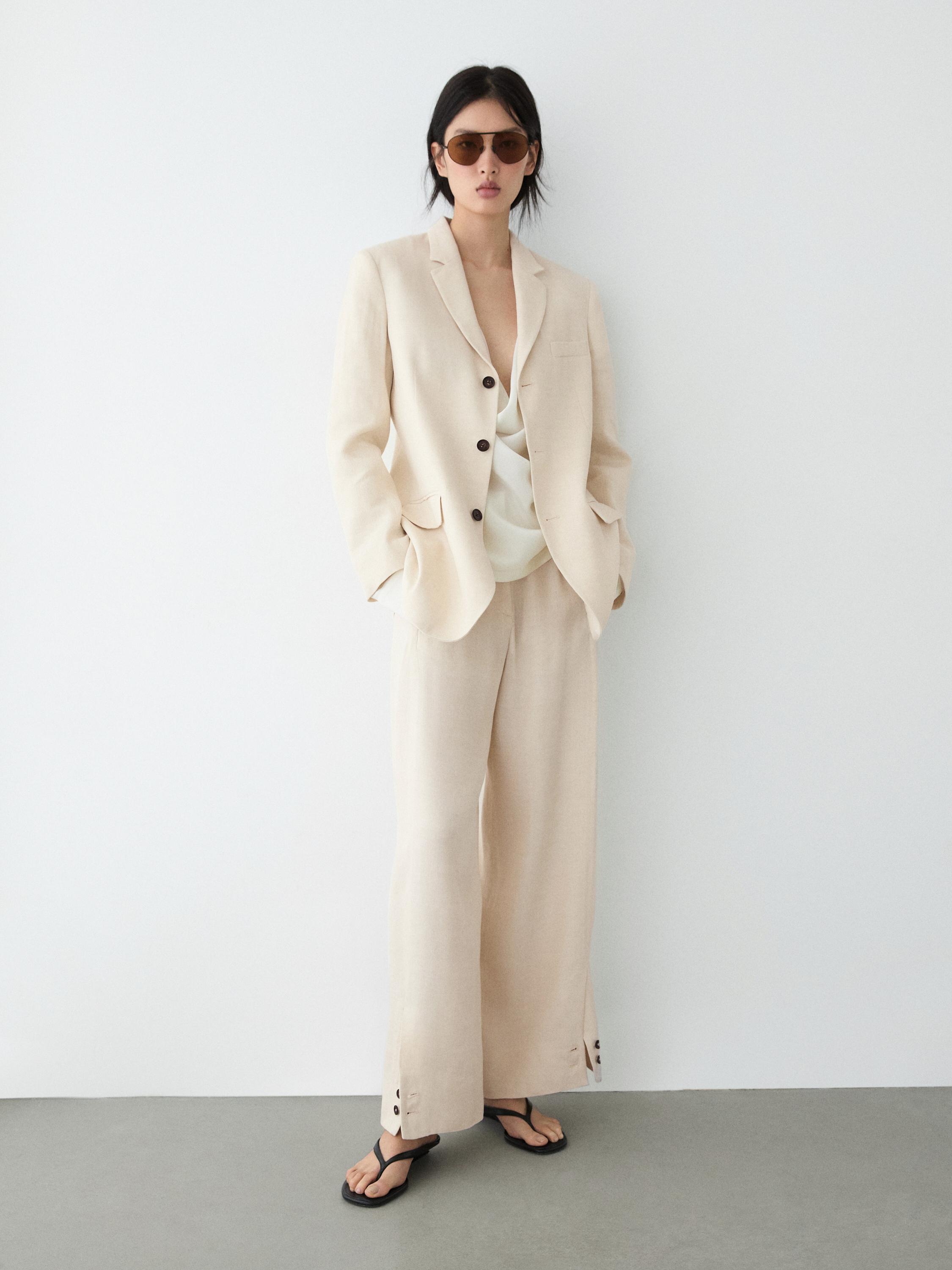 Linen blend suit trousers with button detail — CREAM